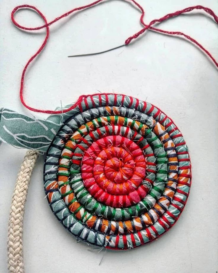 Creative - Scrap fabric stitched into a colorful spiral, turning ...