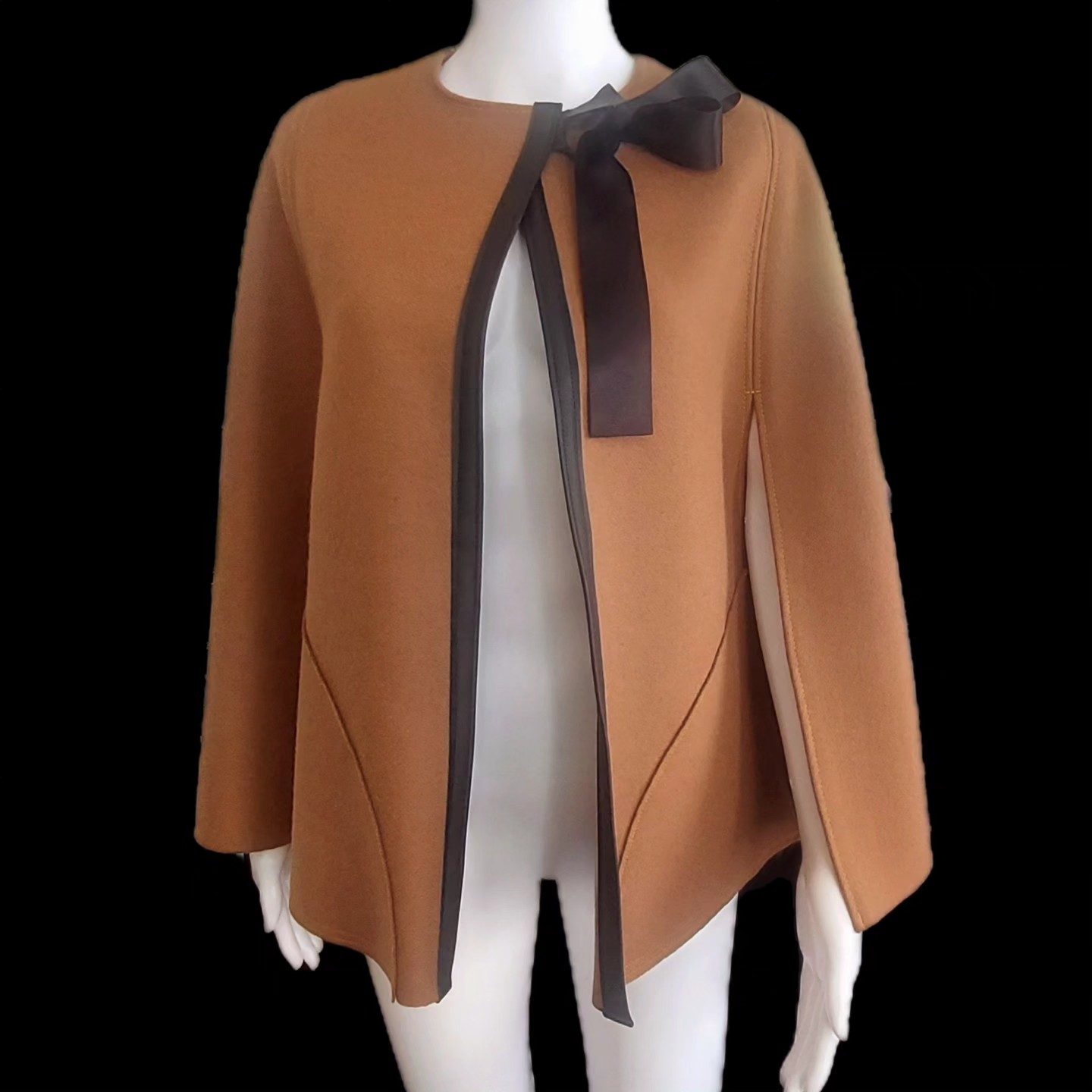 AW23 Outerwear Collection​ The wool-blend cape​ Discover the