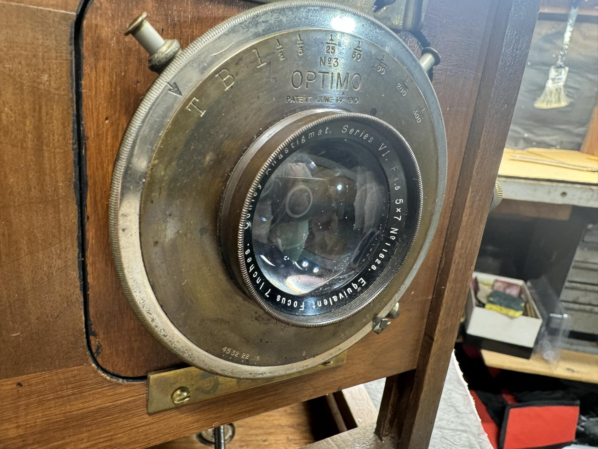 What is this old wooden 4x5 camera with Wollensak lens and Optimo
