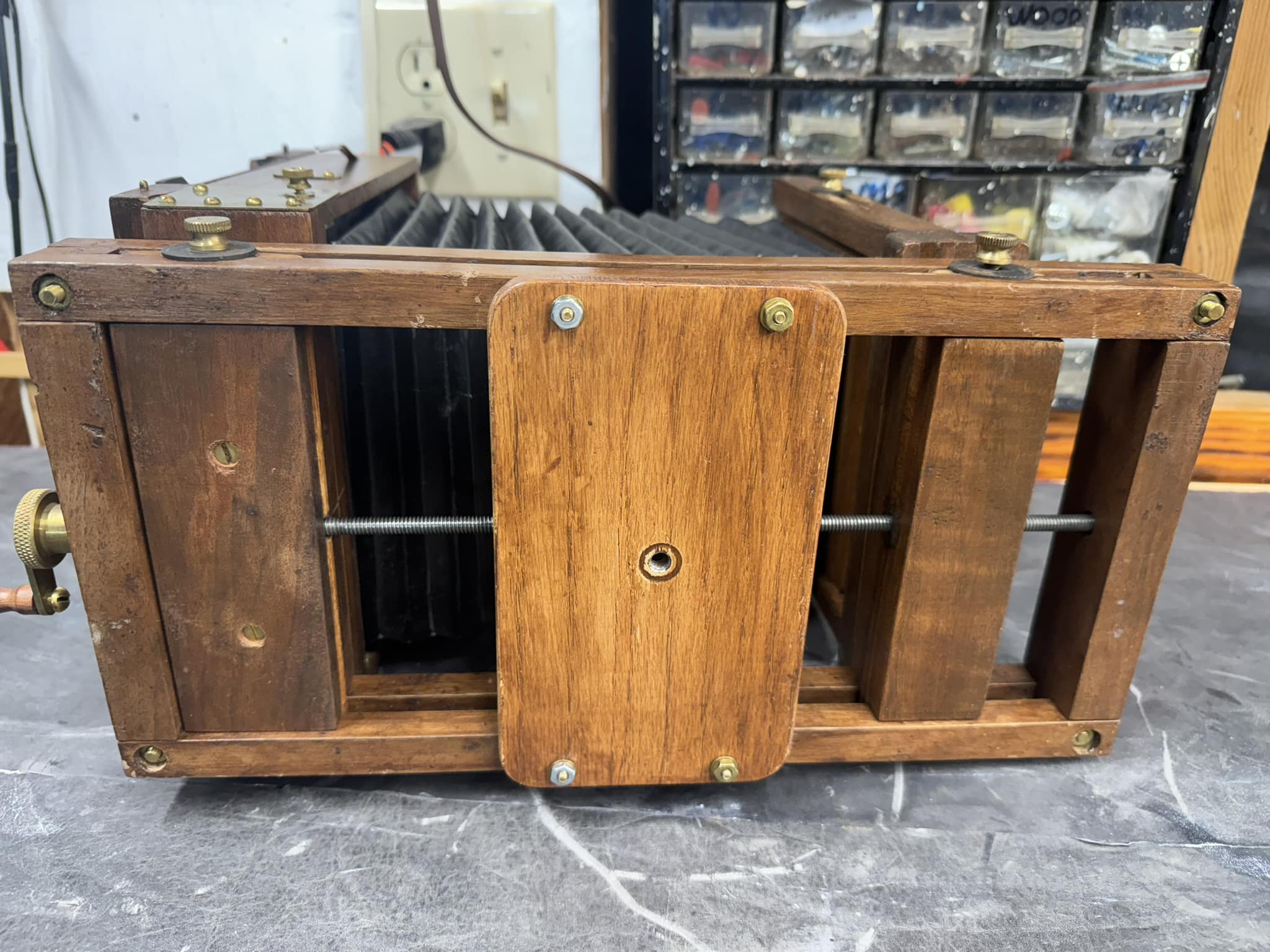 What is this old wooden 4x5 camera with Wollensak lens and Optimo