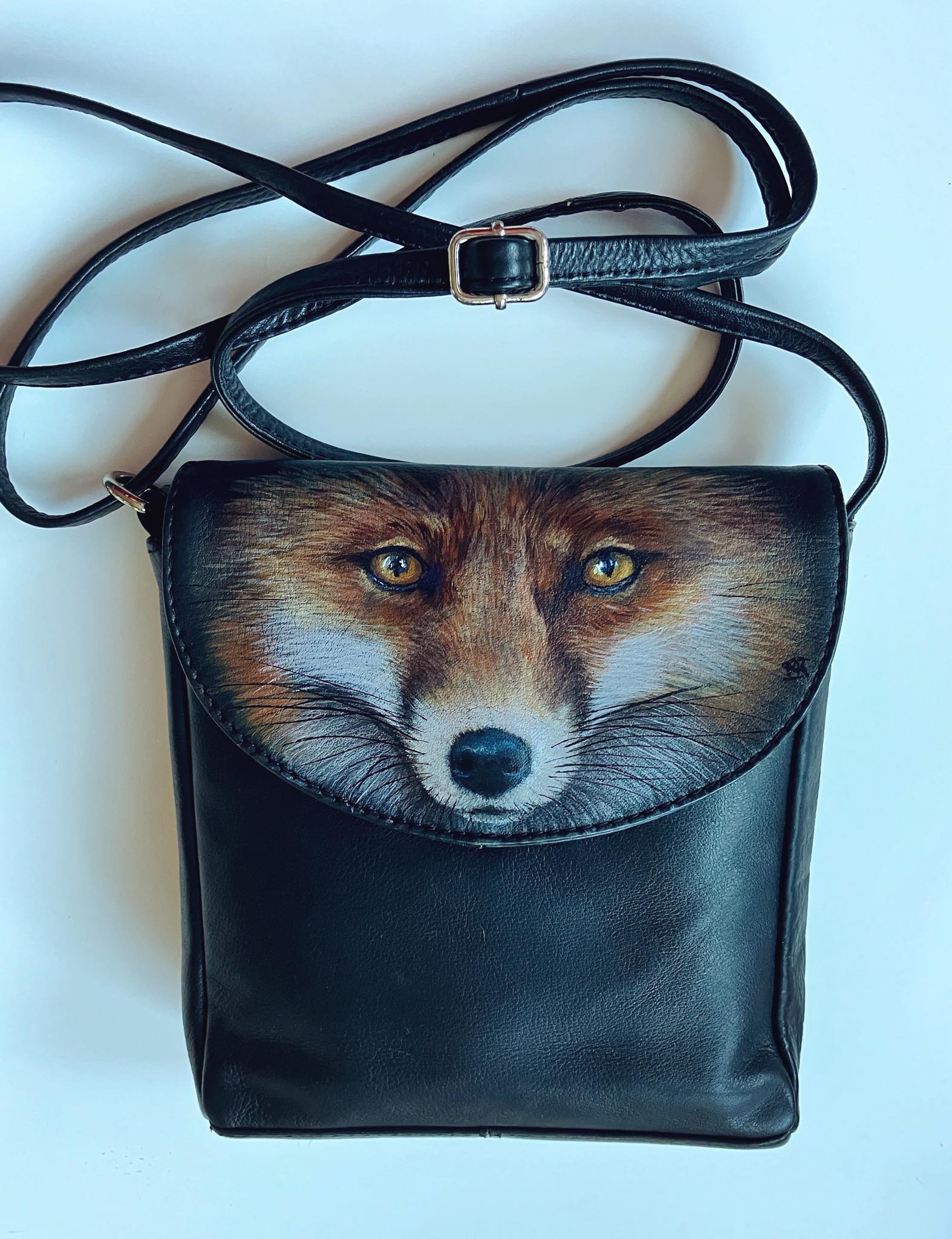 Handmade leather bag and painting art