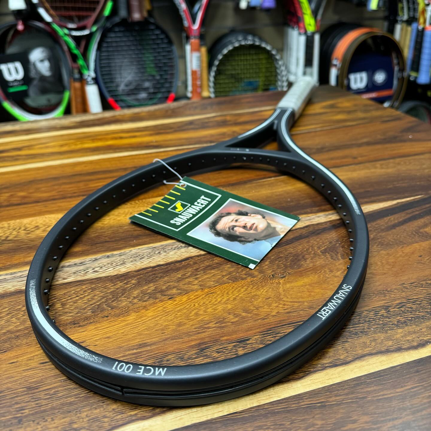 Did Mac use a Snaauwaert racquet in competition?