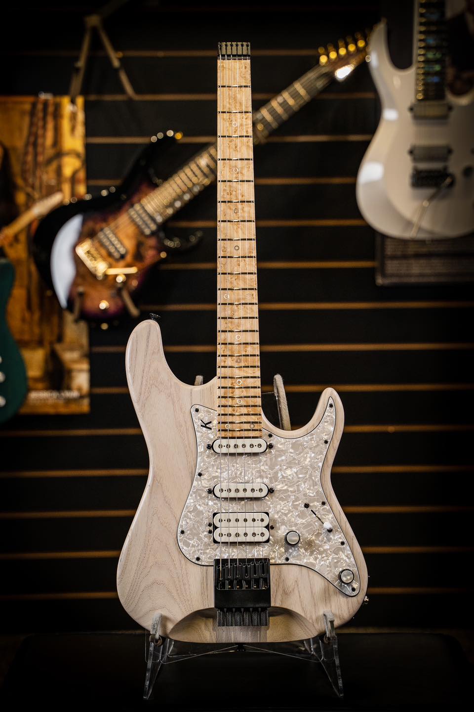 Checkout this Headless Delos in a gold top raw tone finish.