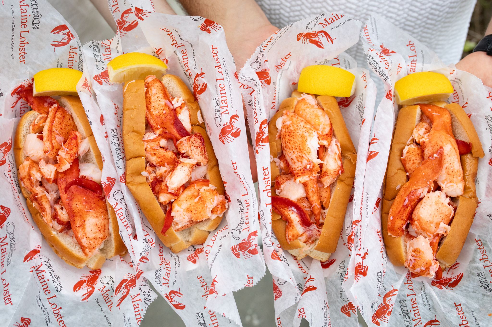 Cousins Maine Lobster in Sacramento, Zeta Luxury Apartments - Lobster Trap Bay Glass Apartment Complex