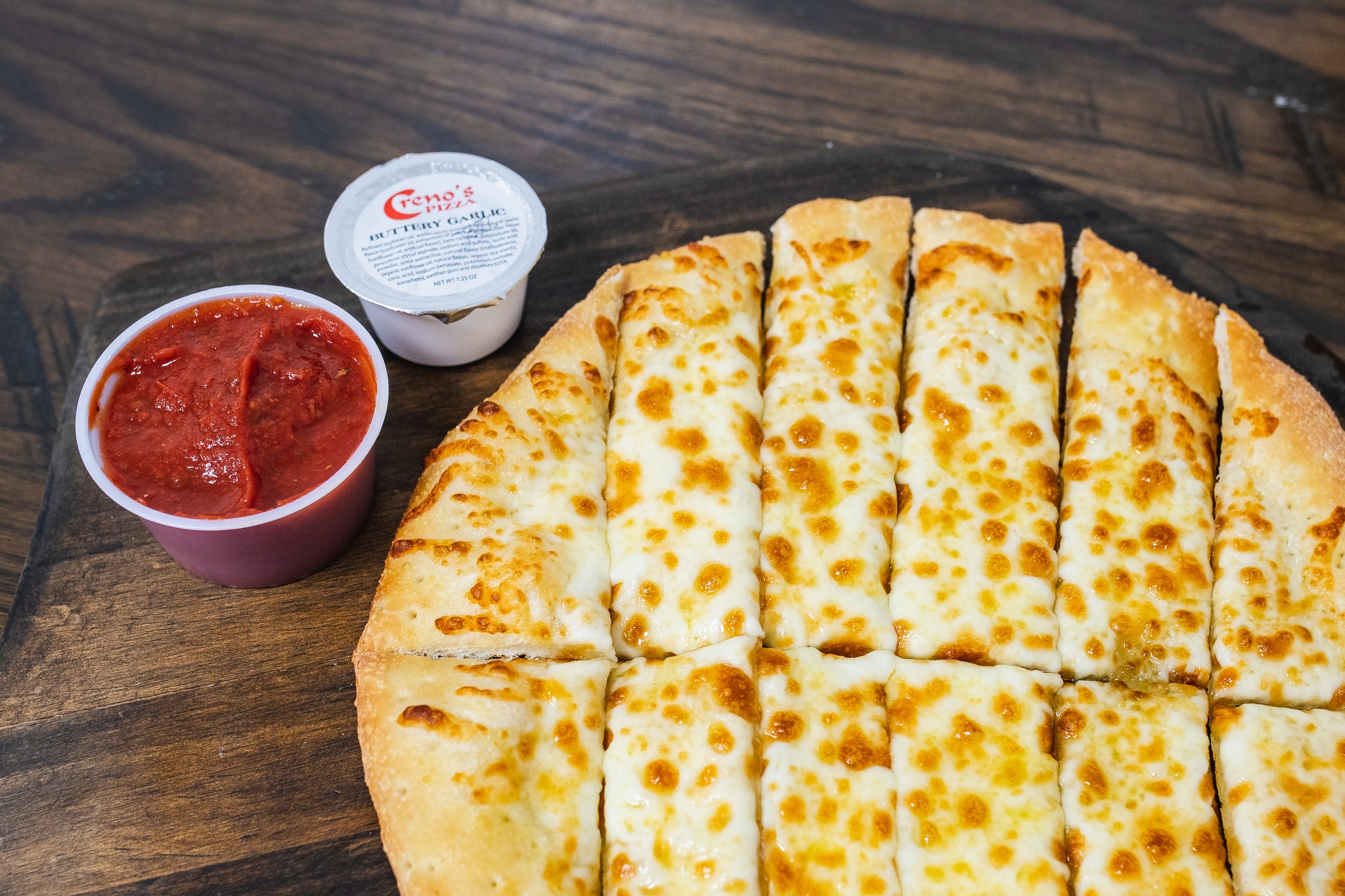 The Cheesy Garlic Flat Bread is one of... - Creno's Pizza Co. | Facebook