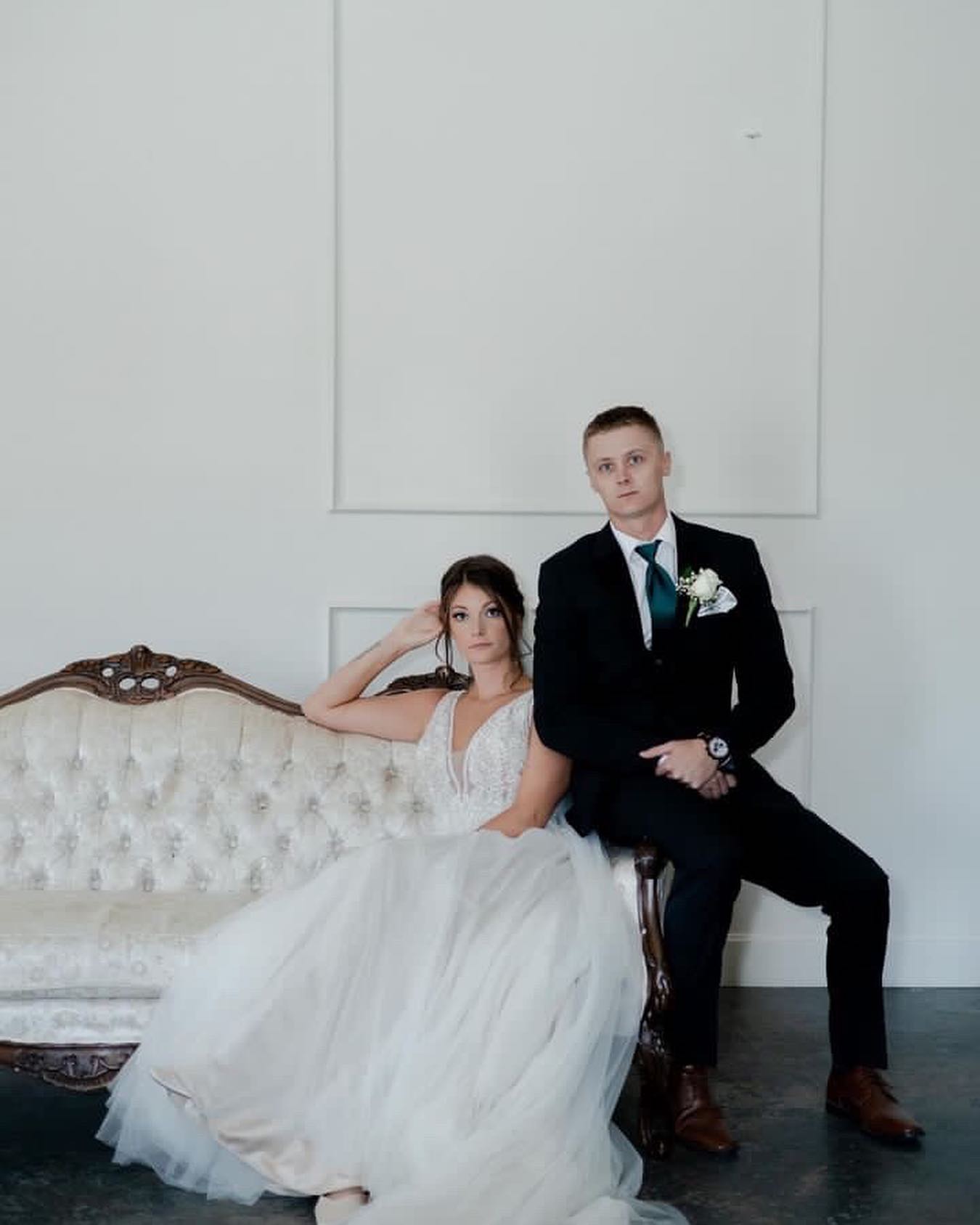 Do brides need to buy off-white shirts for ivory wedding dresses?