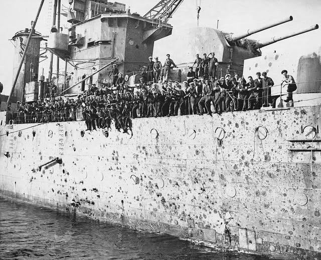 NavalHistoria - The crew of HMS Penelope (97) are shown here from one ...