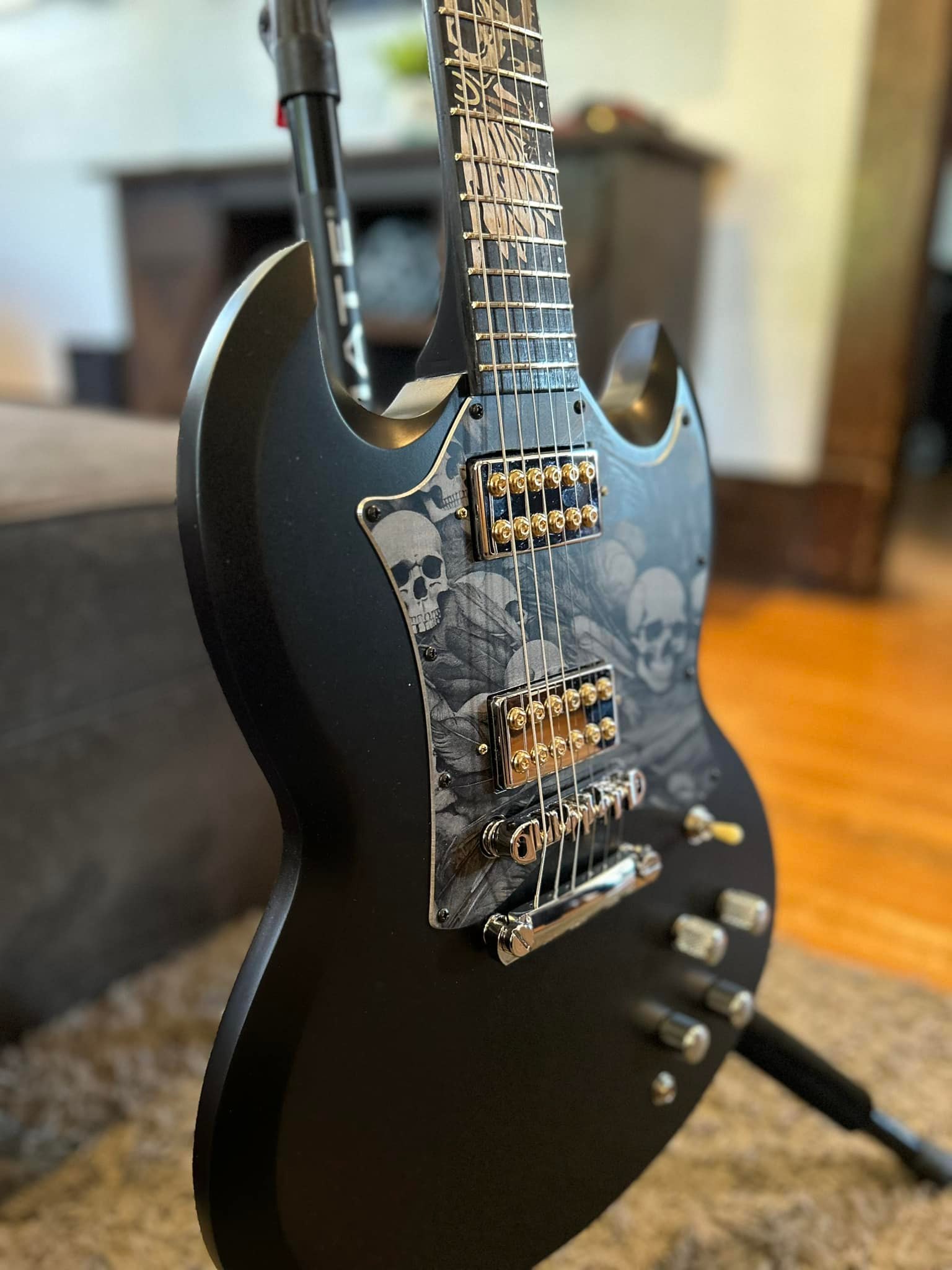 Custom SG guitar with unique wood inlays and Dragonfire Crusader