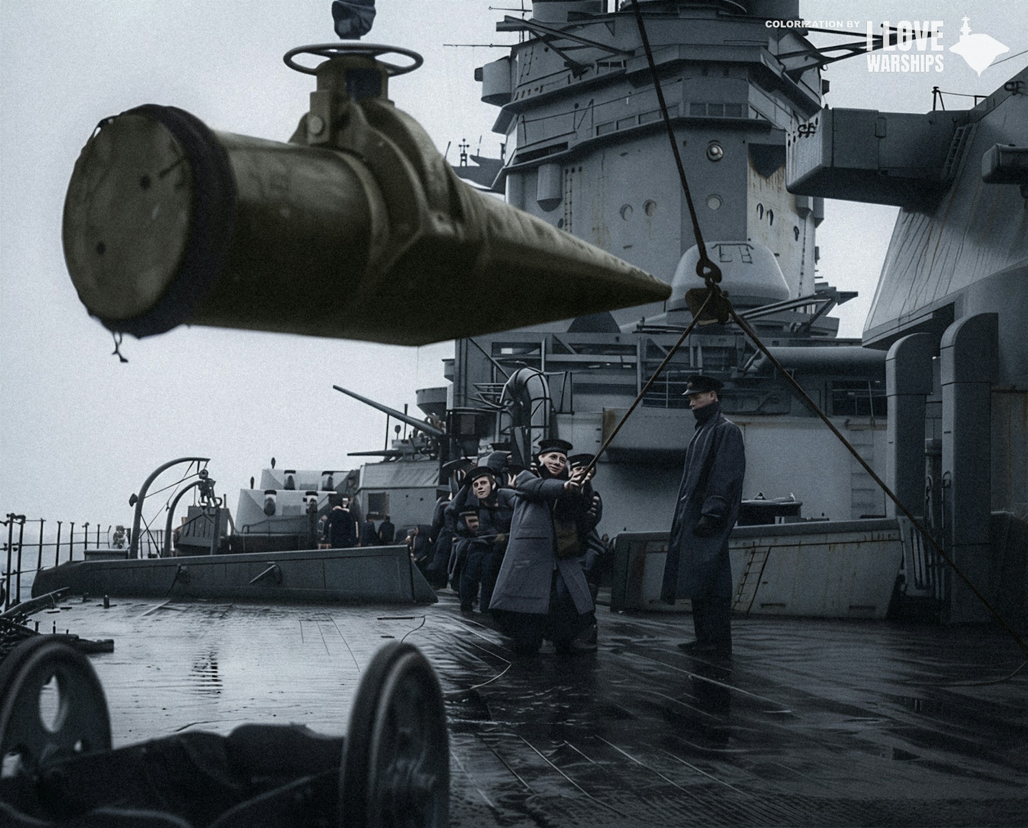 I love - Sailors aboard HMS Rodney maneuver a 16-inch shell during an ...