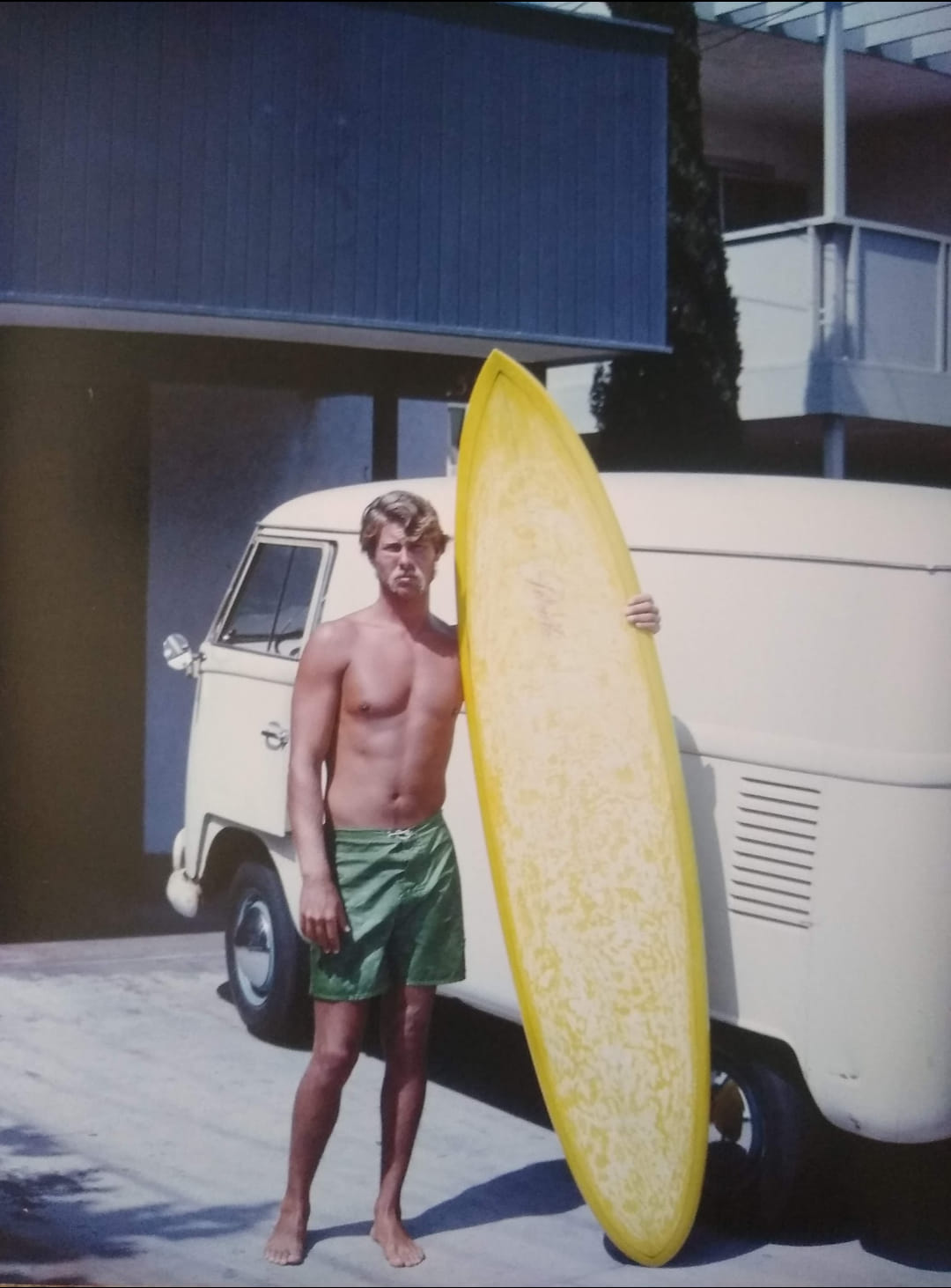 My brother with his plastic fantastic surfboard, probably around
