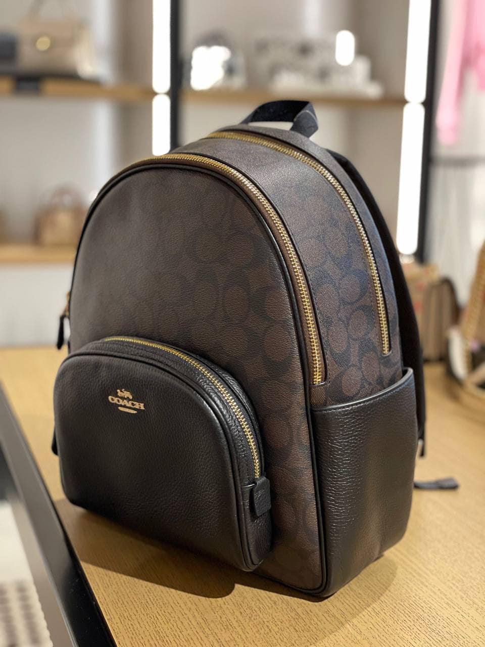 coach court medium backpack In Signature Denim Refined pebble leather Inside zip and multifunction pockets Double zip closure fabric lining Handle with 2 1/4 drop Outside zip pocket Adjustable shoulder straps 10 3/4 (L) x 12 1/2 (H) x 4 3/4 (W) Style No. Coach Women's Court Backpack In