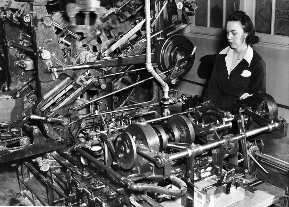 History - Mary Bauman monitors the operation of an elaborate box ...
