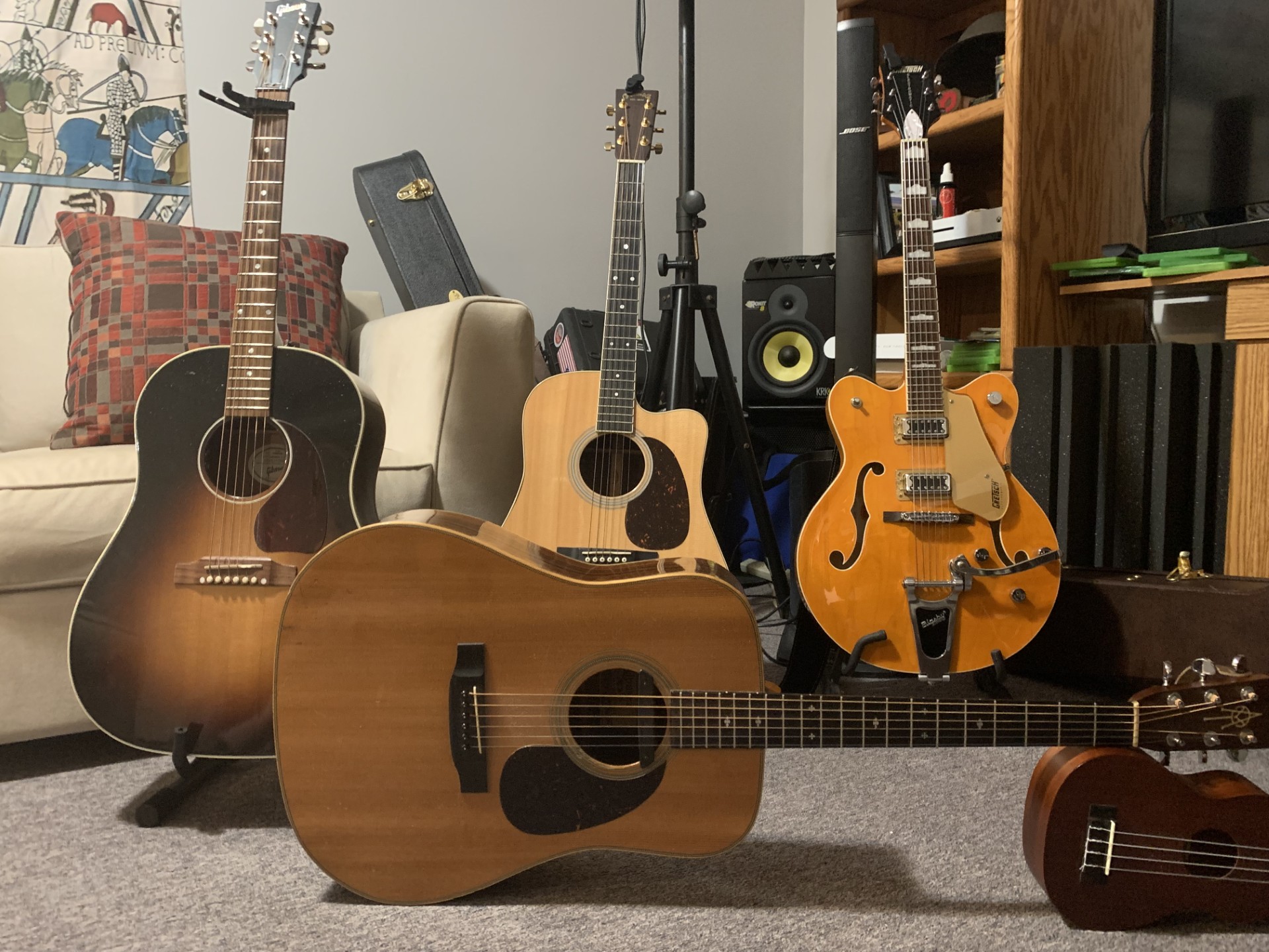 Comparing Taylor 916, Martin D-42, and Gibson Dove acoustic guitars