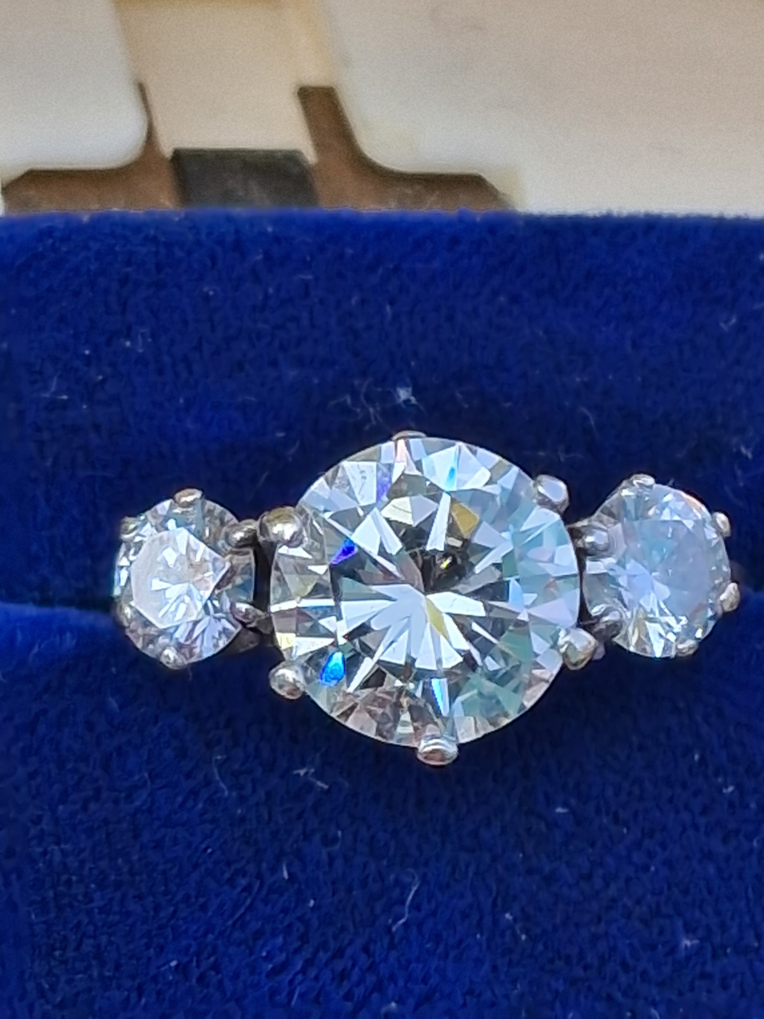 What is the origin and value of a vintage ring with intertwined 