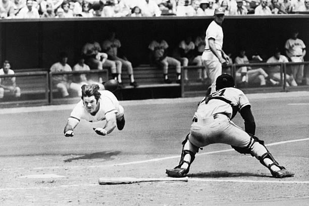 Ohio - Pete Rose dives over home plate past Giants catcher Dave Rader ...