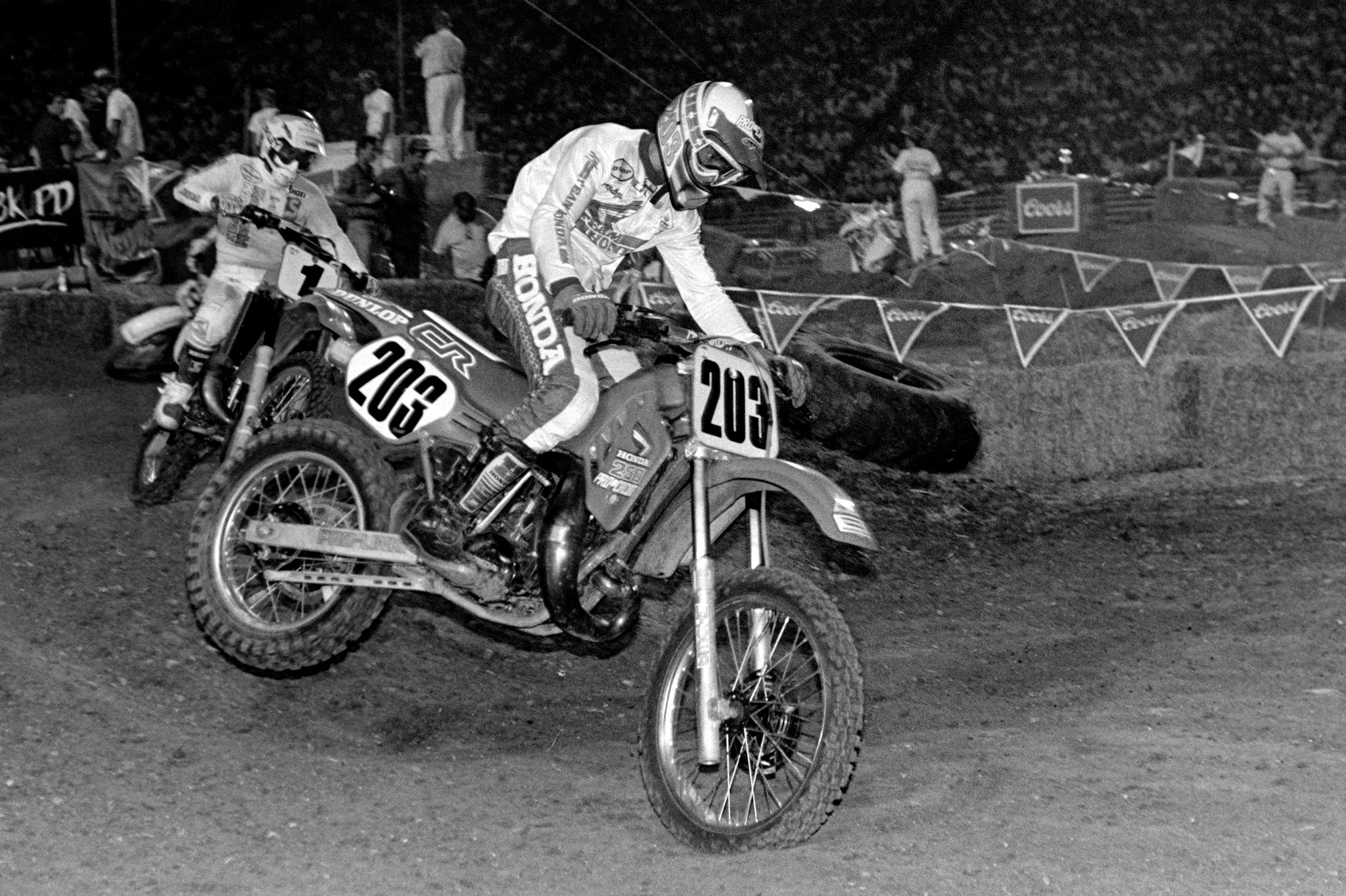 Rider - Jeff Leisk, riding a Pro Circuit Honda CR250, leading Jeff Ward ...