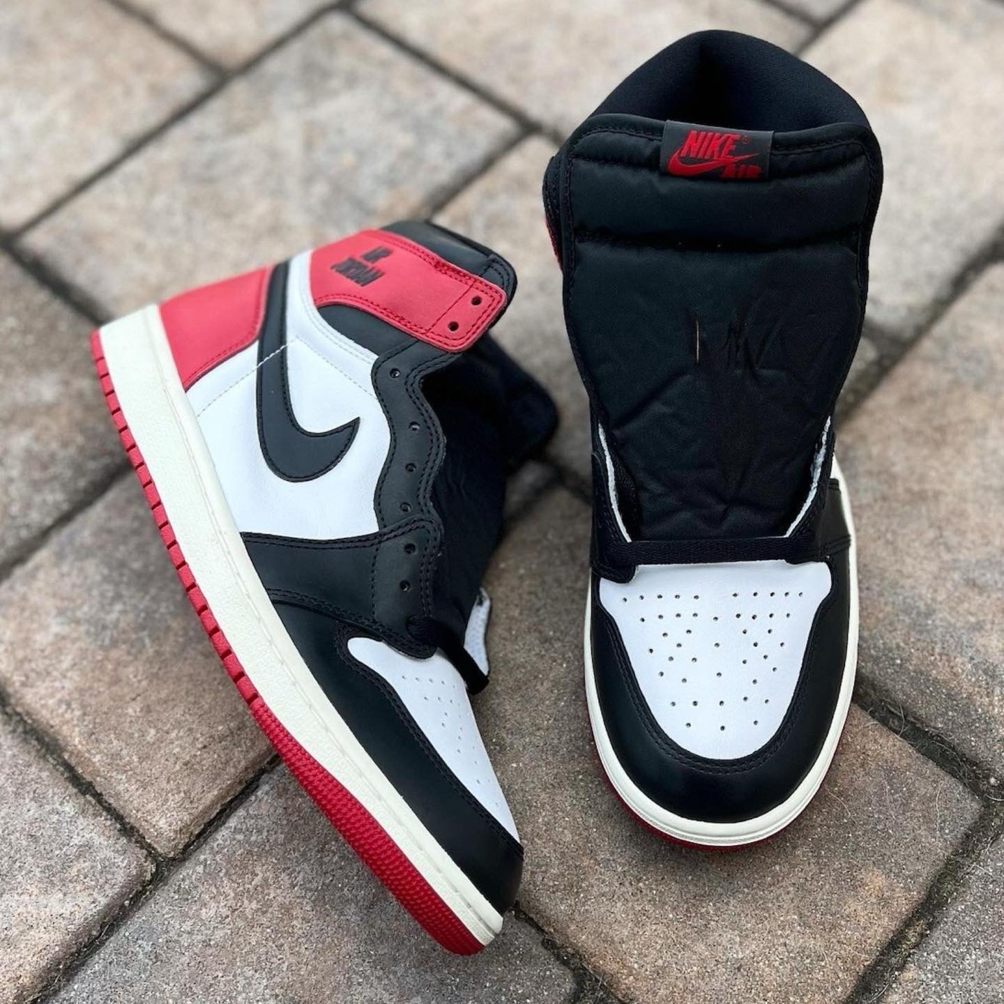 Fresh new looks at the Air Jordan 1 High OG “Black Toe Reimagined 