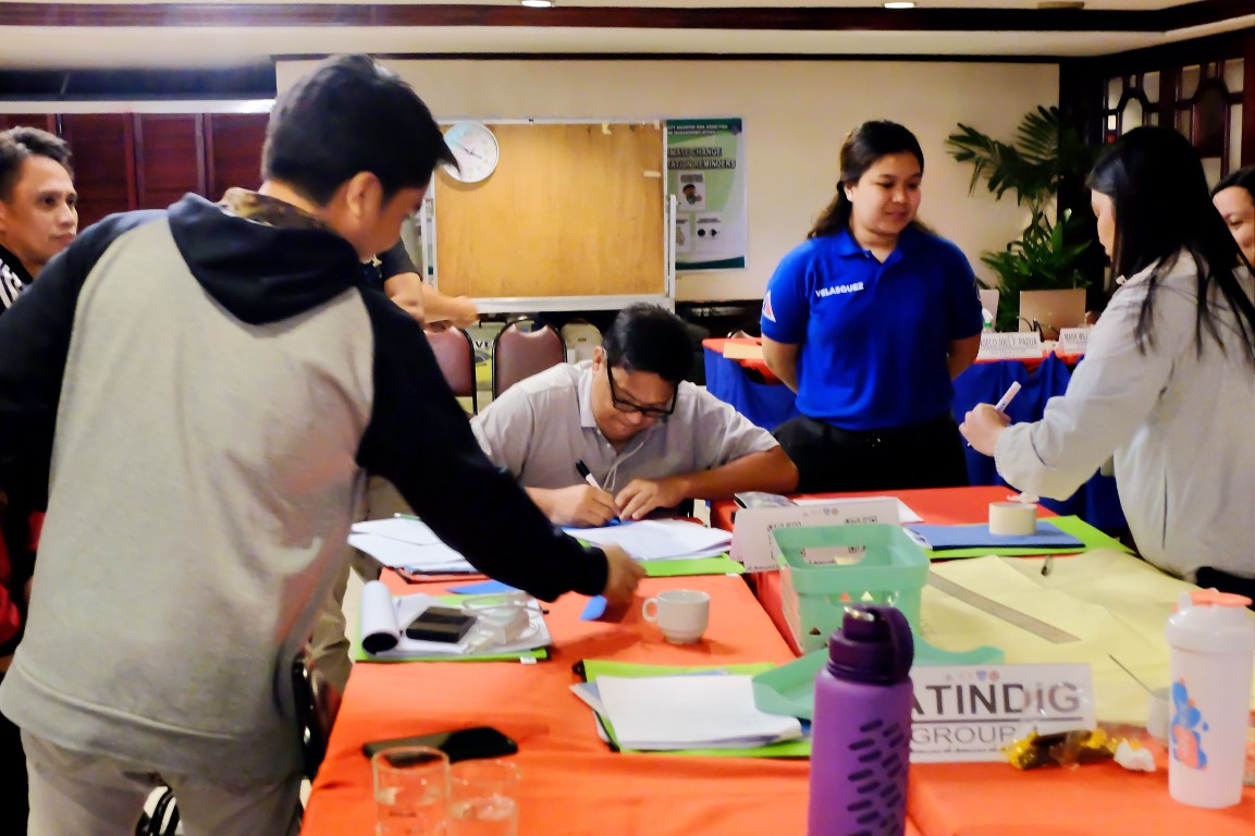 Participants of the Basic Incident Command Training Course answer an ...
