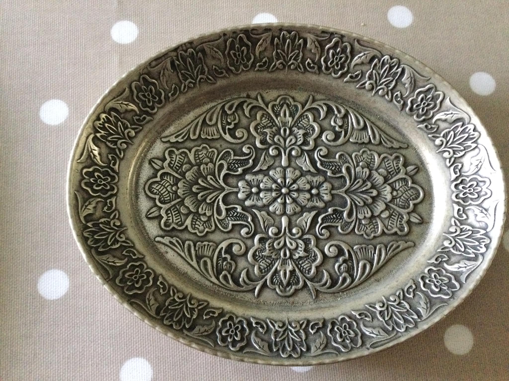 Are plates from Crown Castle Ltd real pewter or an aluminum zinc