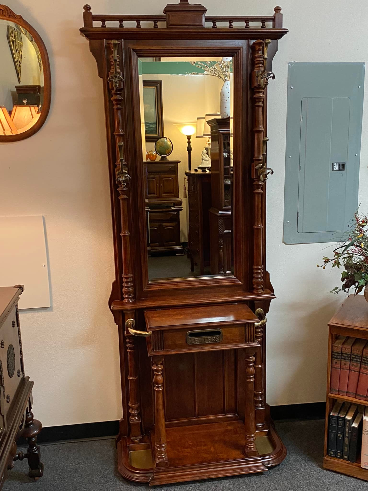 Beautiful Pulaski Furniture Co. hall tree with brass accents $225