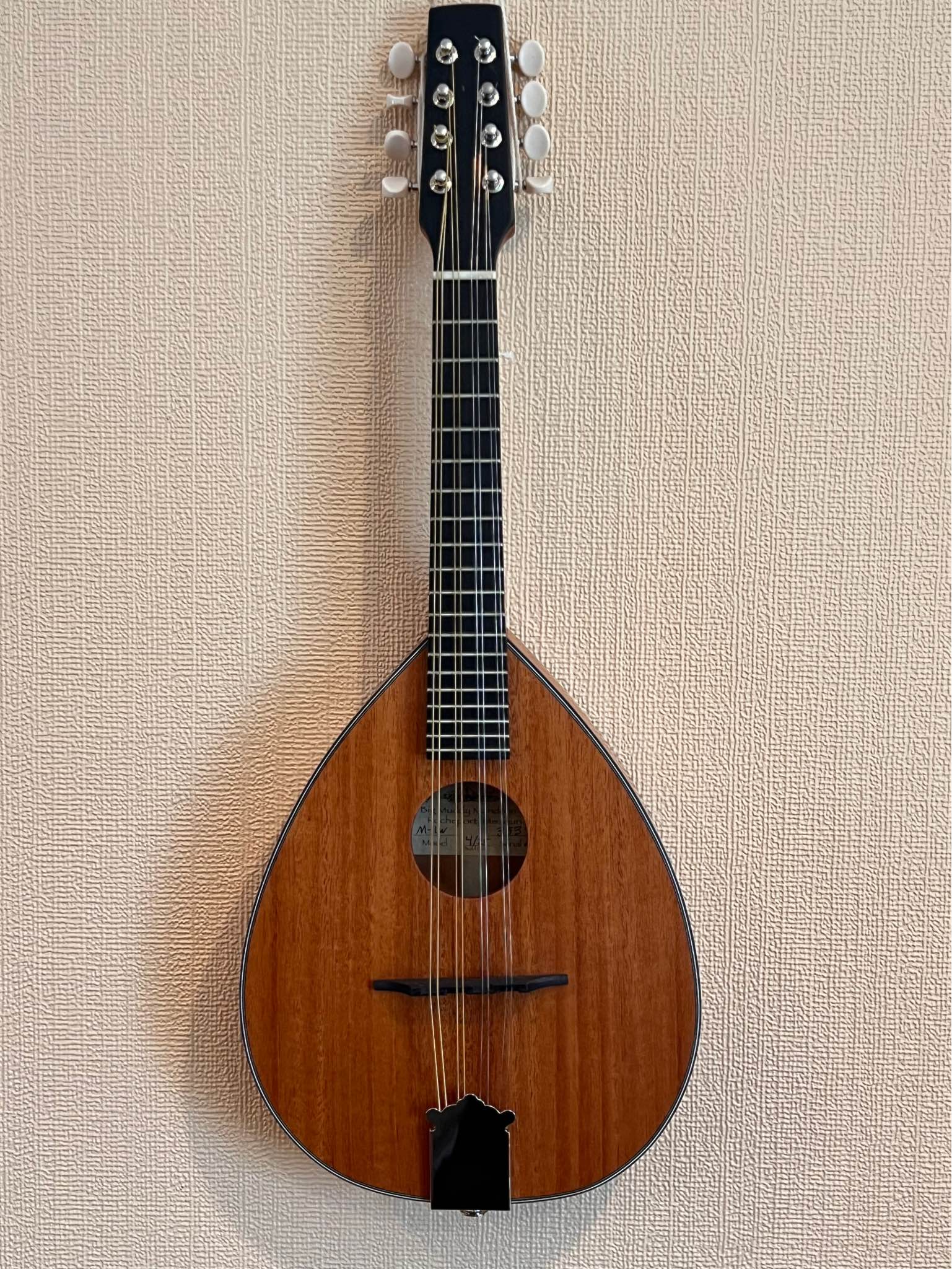 What is the value of an Ovation MM68 mandolin?
