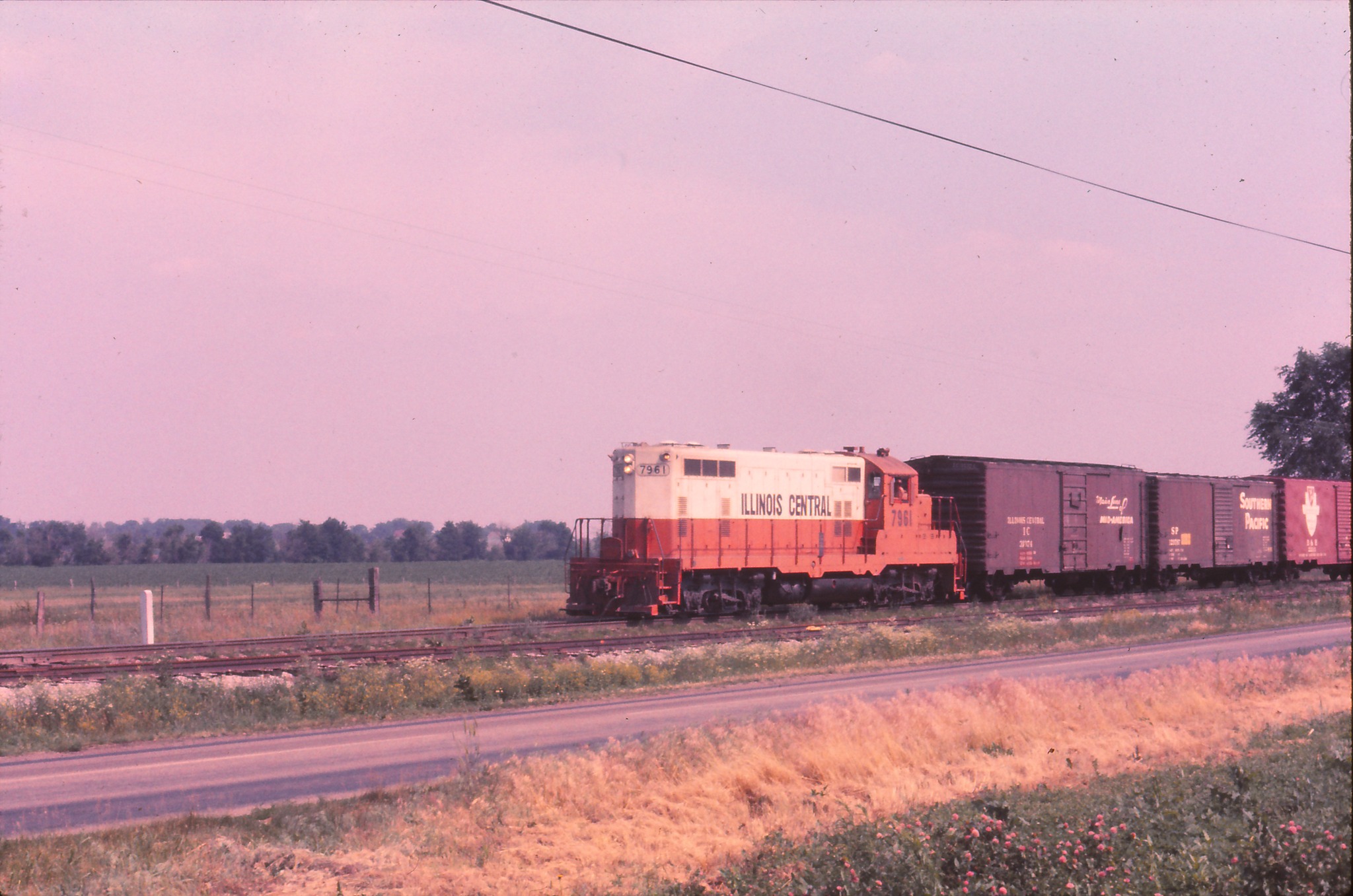 IC GP8 leads mixed freight in 1970s Illinois