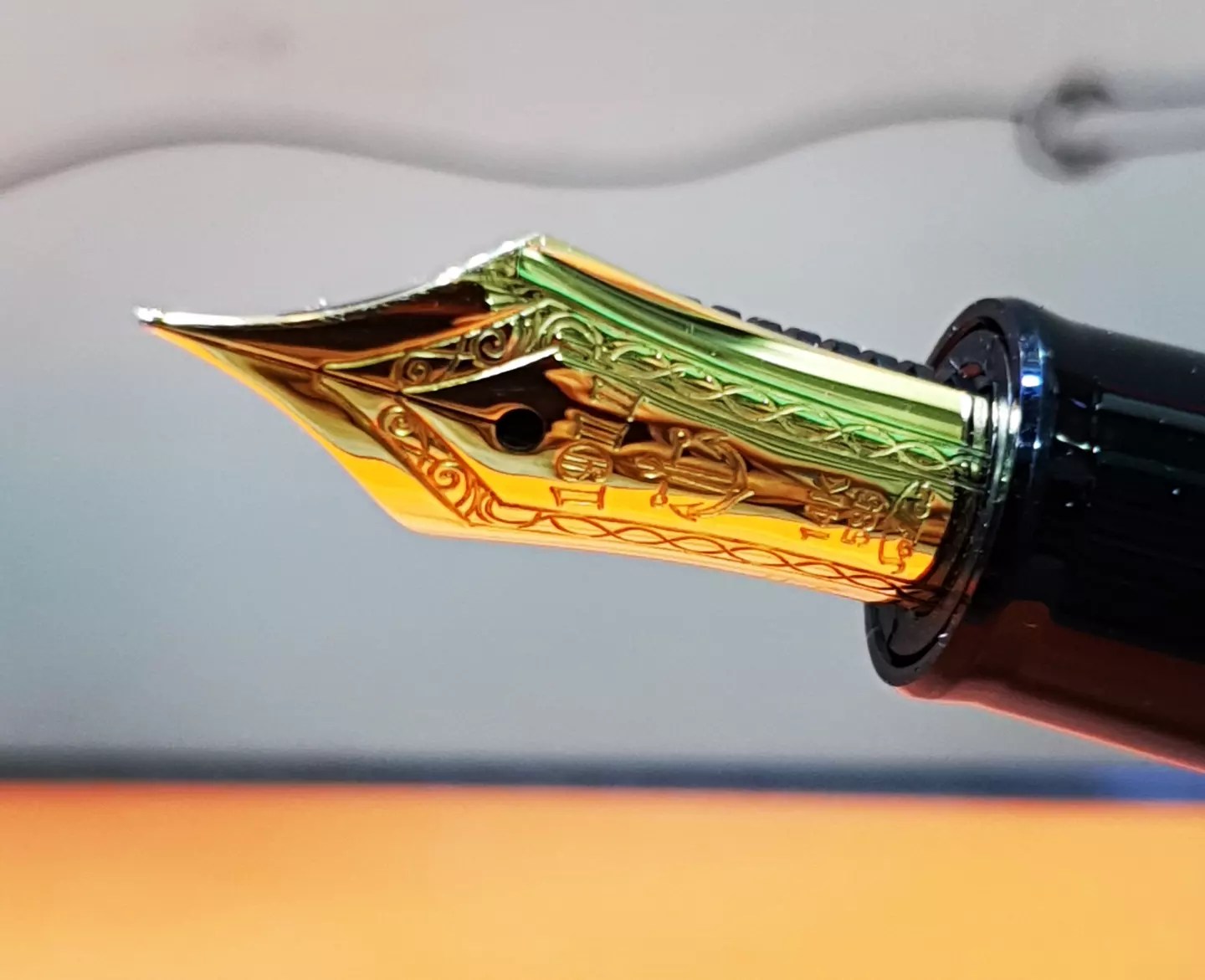 Sailor pens with 'gold from the Swiss bank' engraving