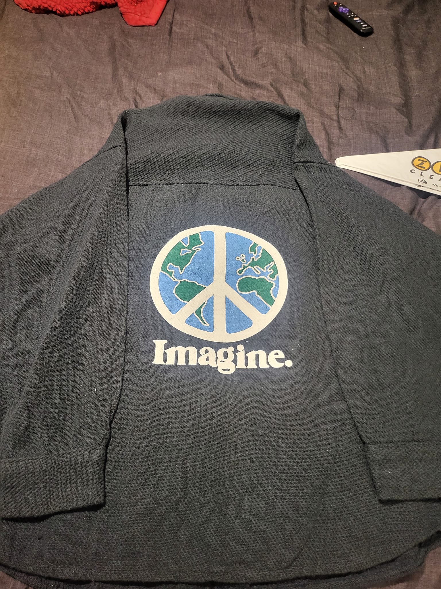 What is a Molina handmade cotton jacket with peace signs?