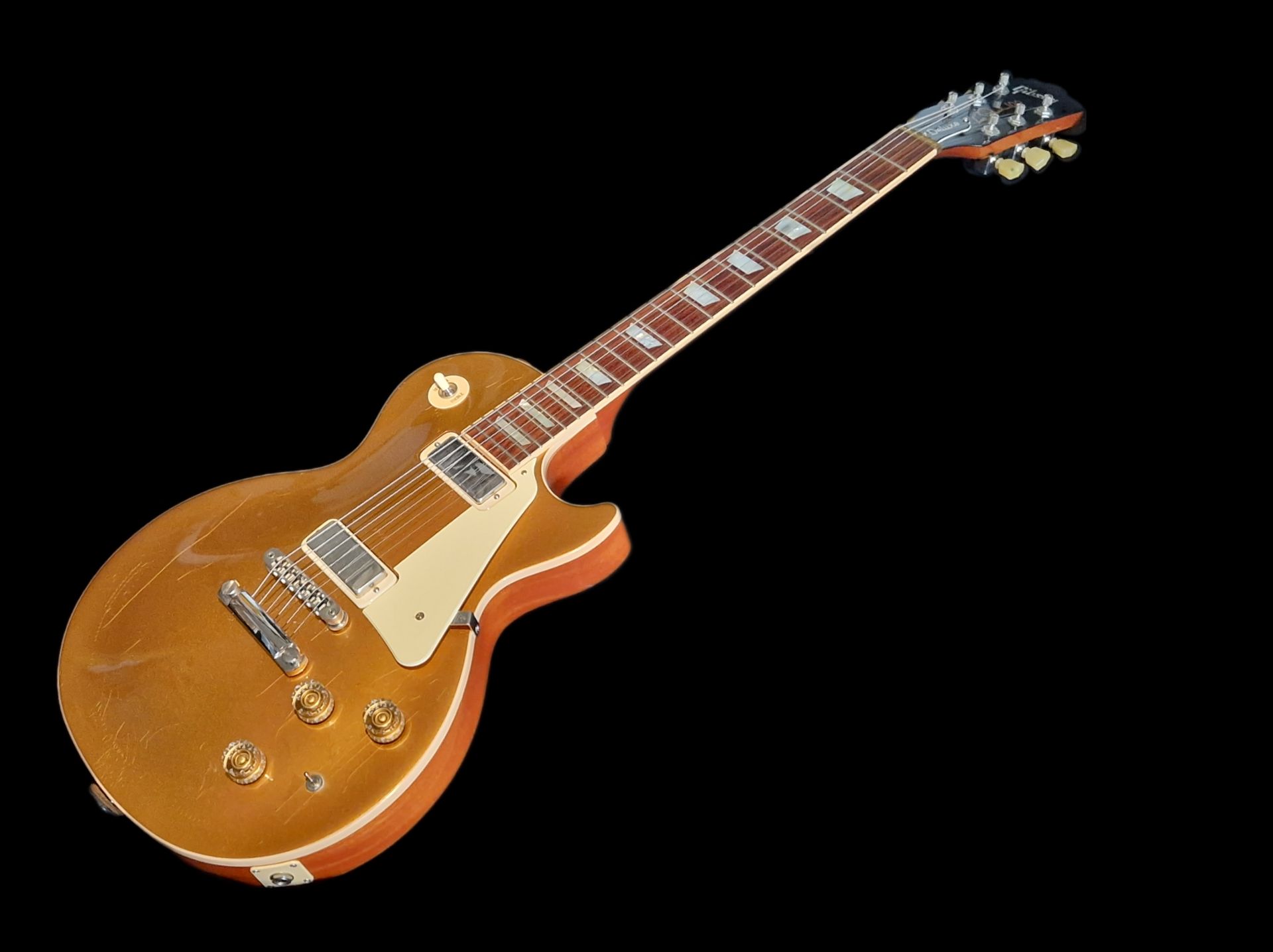What is the value of a 2015 Gibson Les Paul Deluxe?