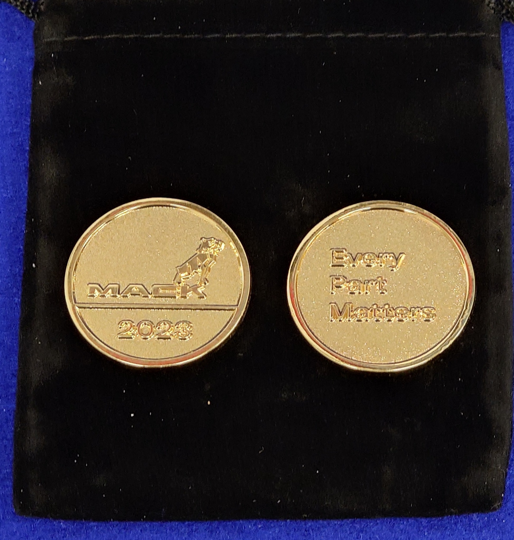 The first Mack coin was... - Mack Trucks Historical Museum