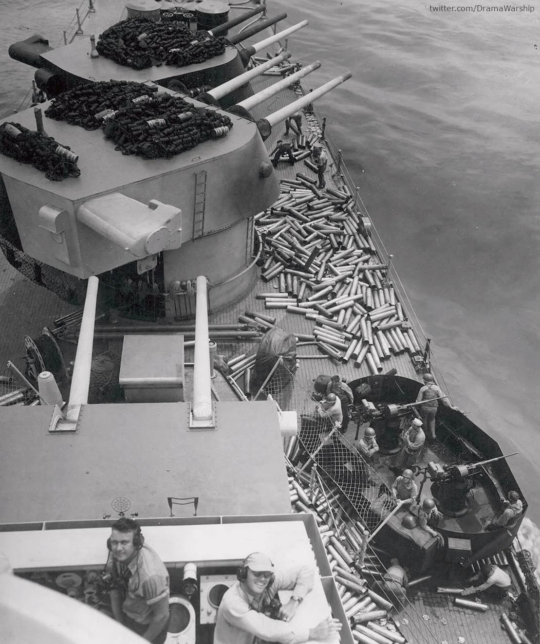 Navy - Spent 152mm shell casings litter the forward deck of the ...