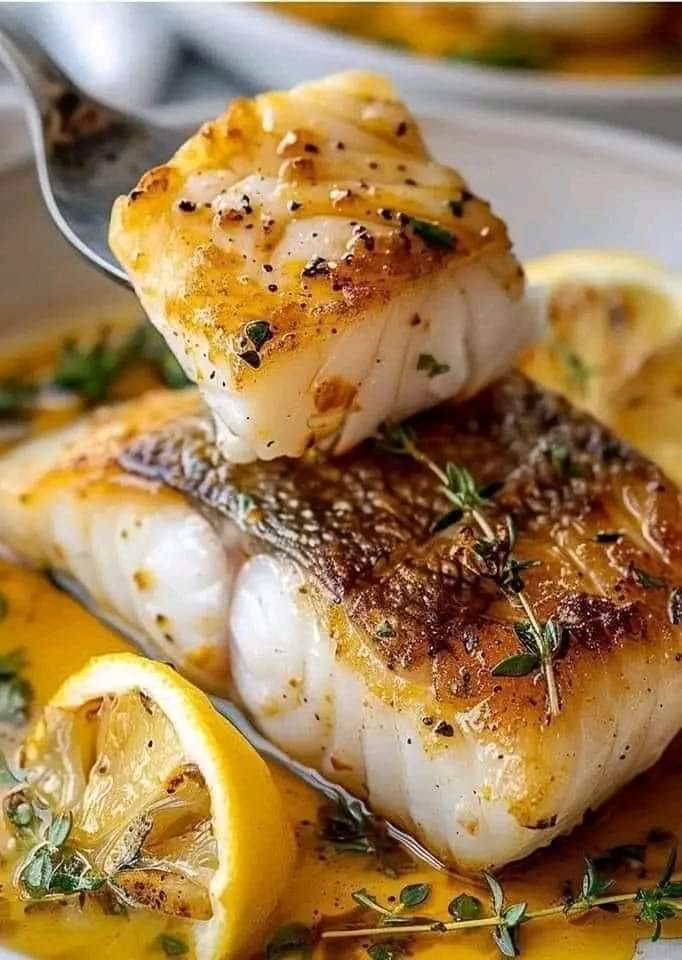 JAMAICAN FOOD | 🐟 𝐆𝐨𝐥𝐝𝐞𝐧 𝐂𝐫𝐢𝐬𝐩 𝐂𝐨𝐝 𝐅𝐢𝐥𝐥𝐞𝐭𝐬 𝐃𝐫𝐢𝐳𝐳𝐥𝐞𝐝 𝐢𝐧 𝐋𝐮𝐬 ... | Facebook