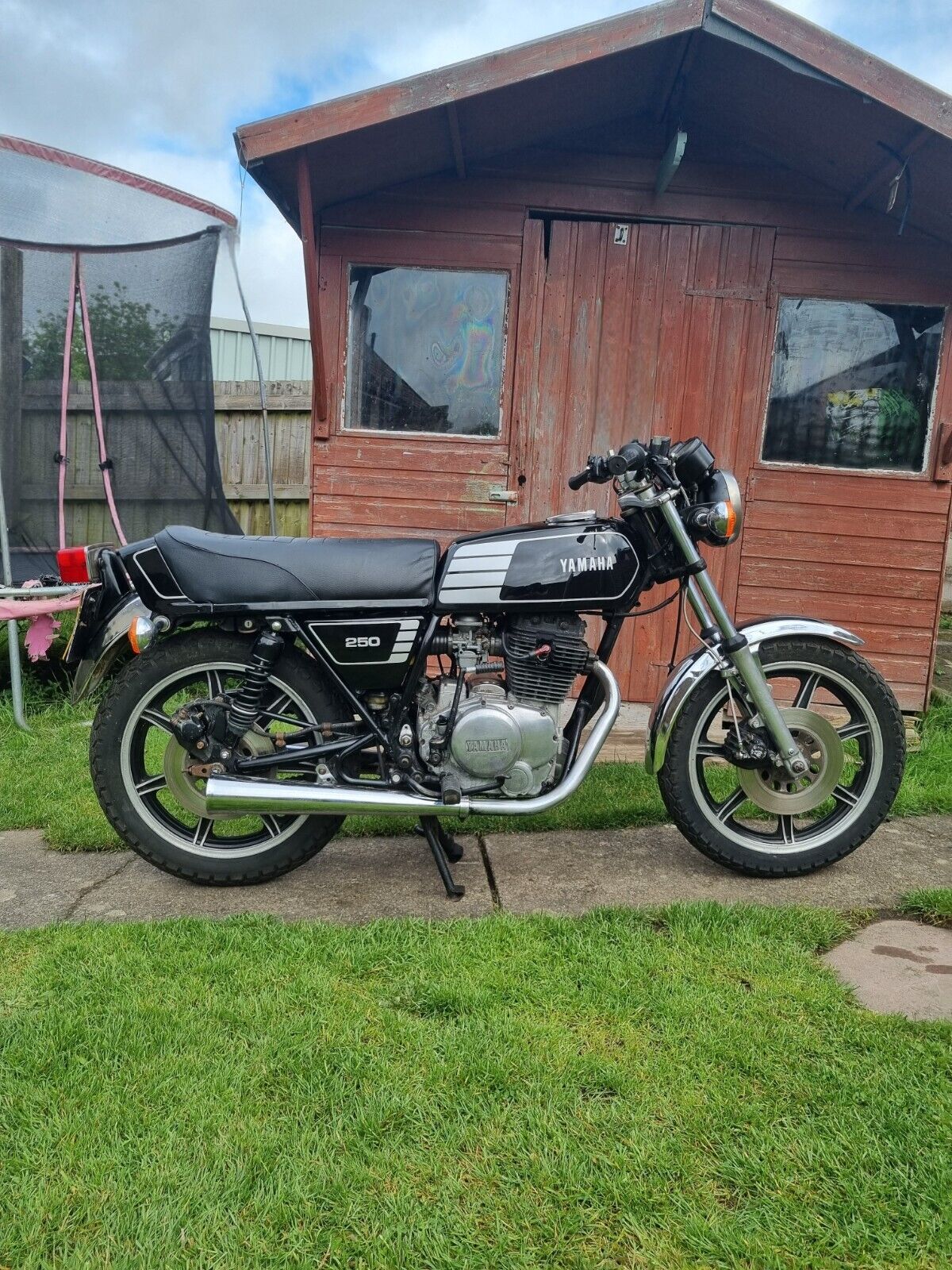 The 1980 Yamaha XS 250 Custom is a striking example of classic