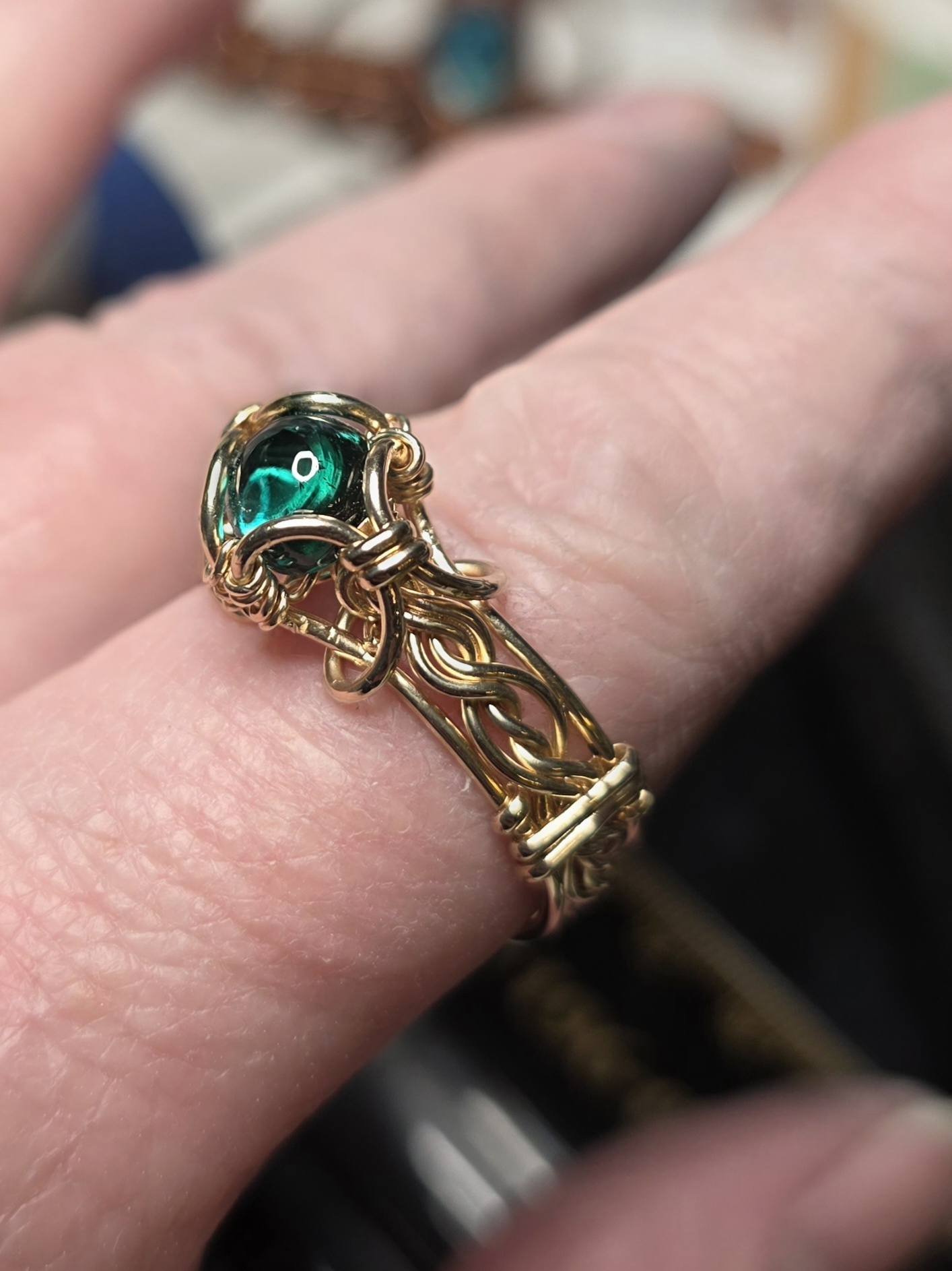 Custom 10k solid gold ring with lab-created emerald