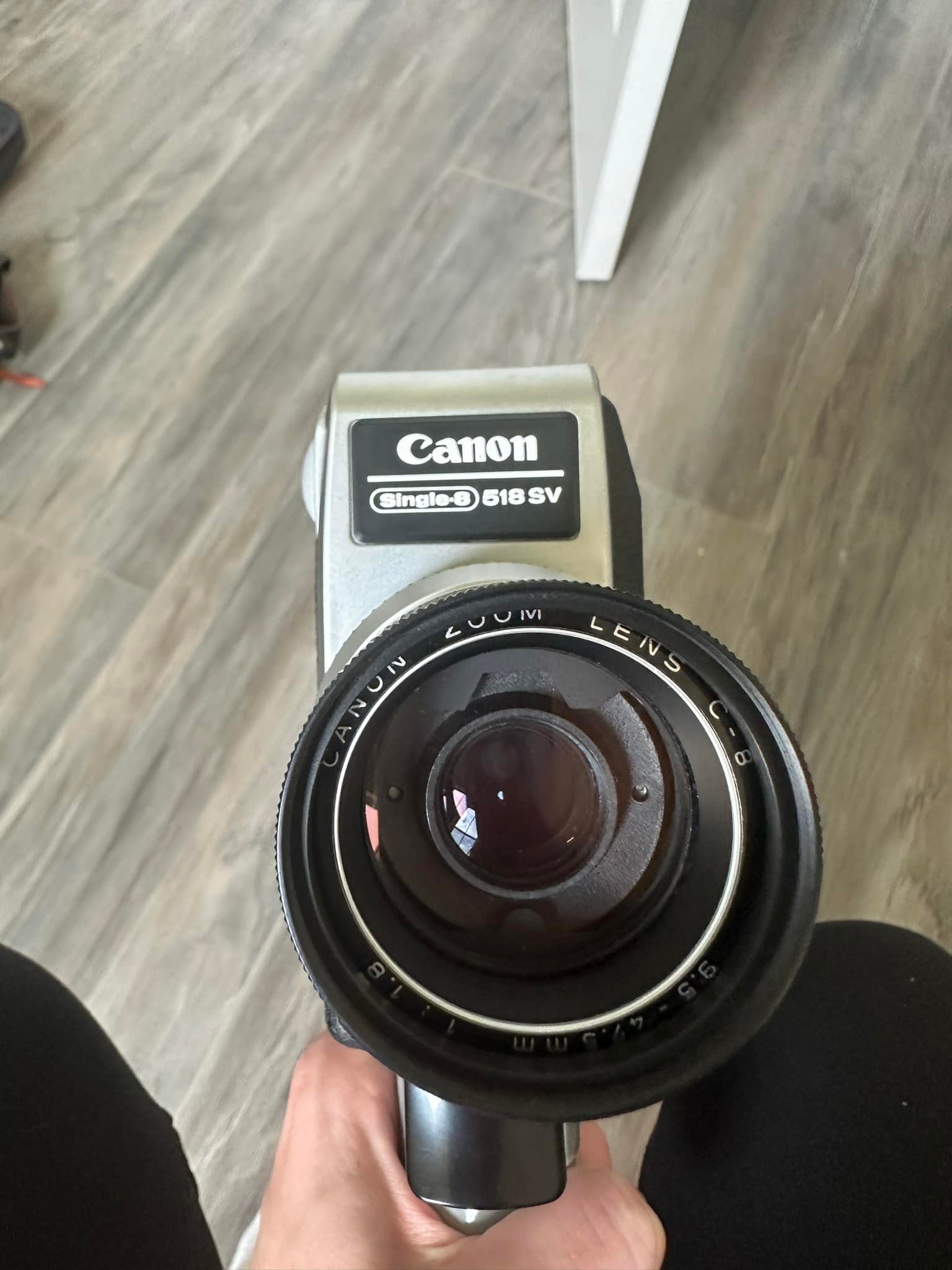 How to use the film chamber on a Canon Single 8 518 SV camera?