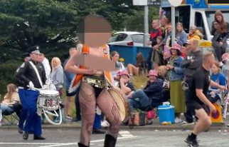 Sunday - WATCH THE VIDEO: Woman flashes shocked onlookers during ...