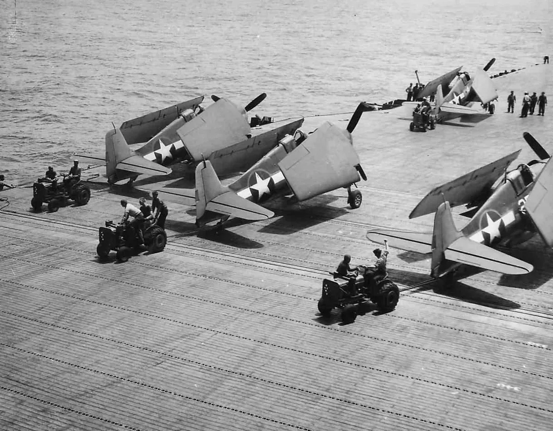 PlaneHistoria - These F6F Hellcats are seen being prepared aboard a ...