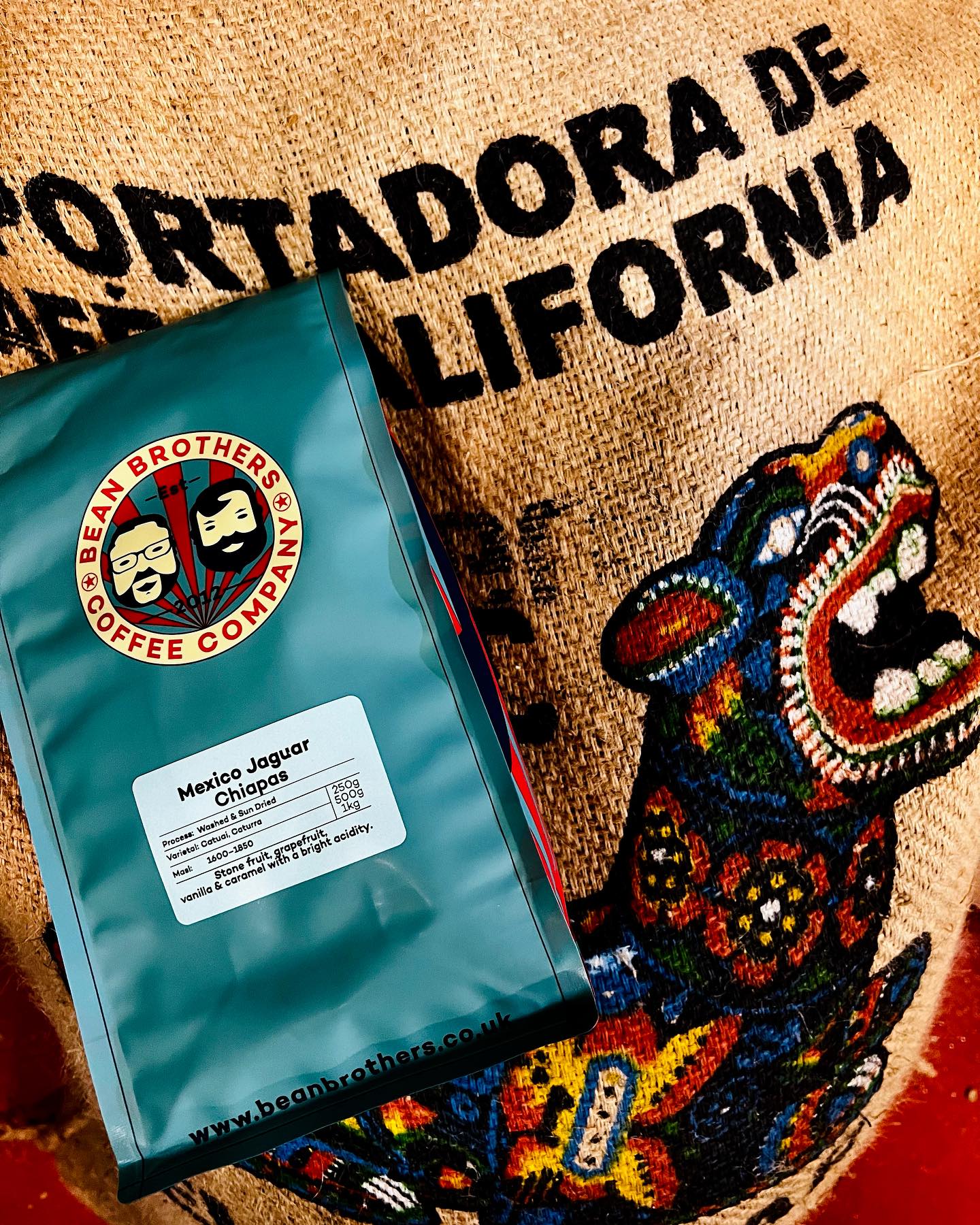 A colorful coffee bag filled with coffee bean flavors of dried