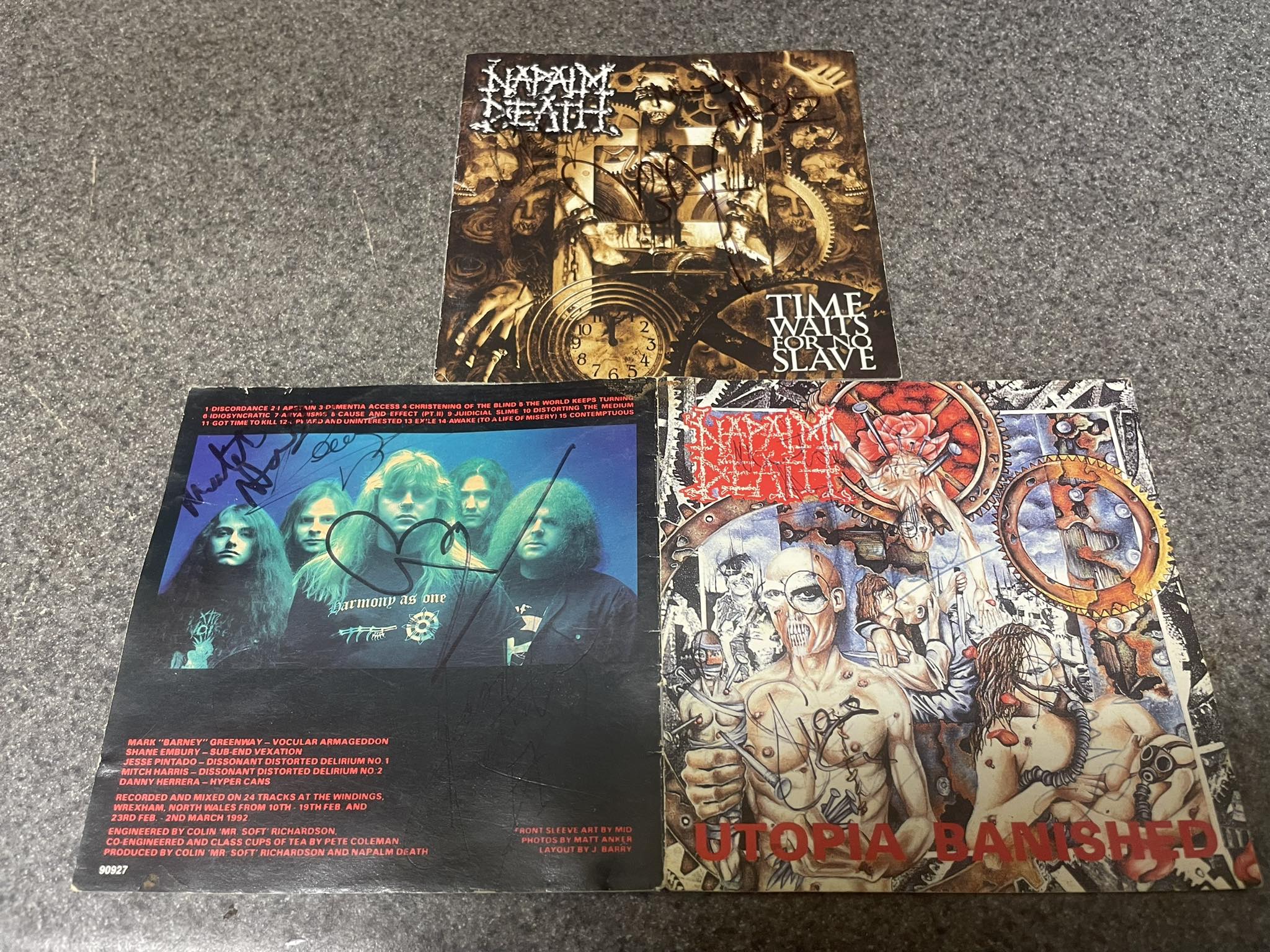 Napalm Death autographed album covers from Time Waits and Utopia 