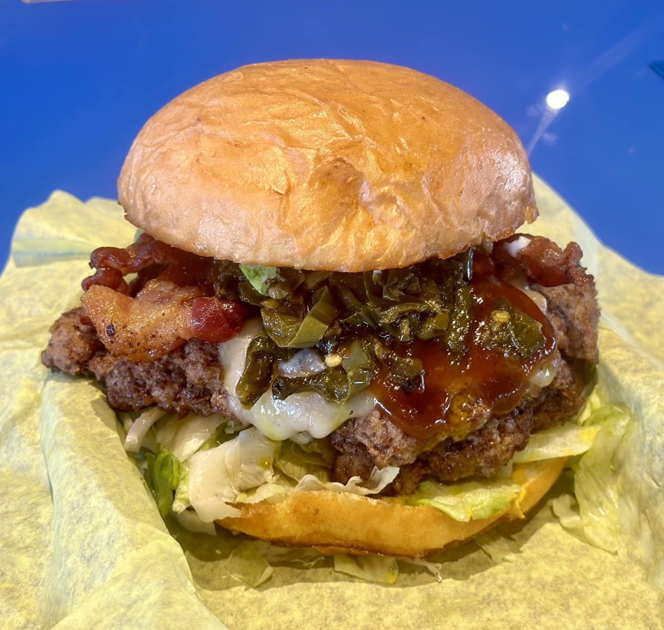 ️🍔 For Texas sized hunger, head... - Blue Sky by Texas Tech