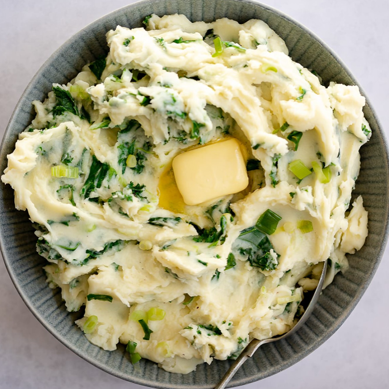 Irish Roots - Colcannon, a classic Irish dish, is a mash-up of potatoes ...