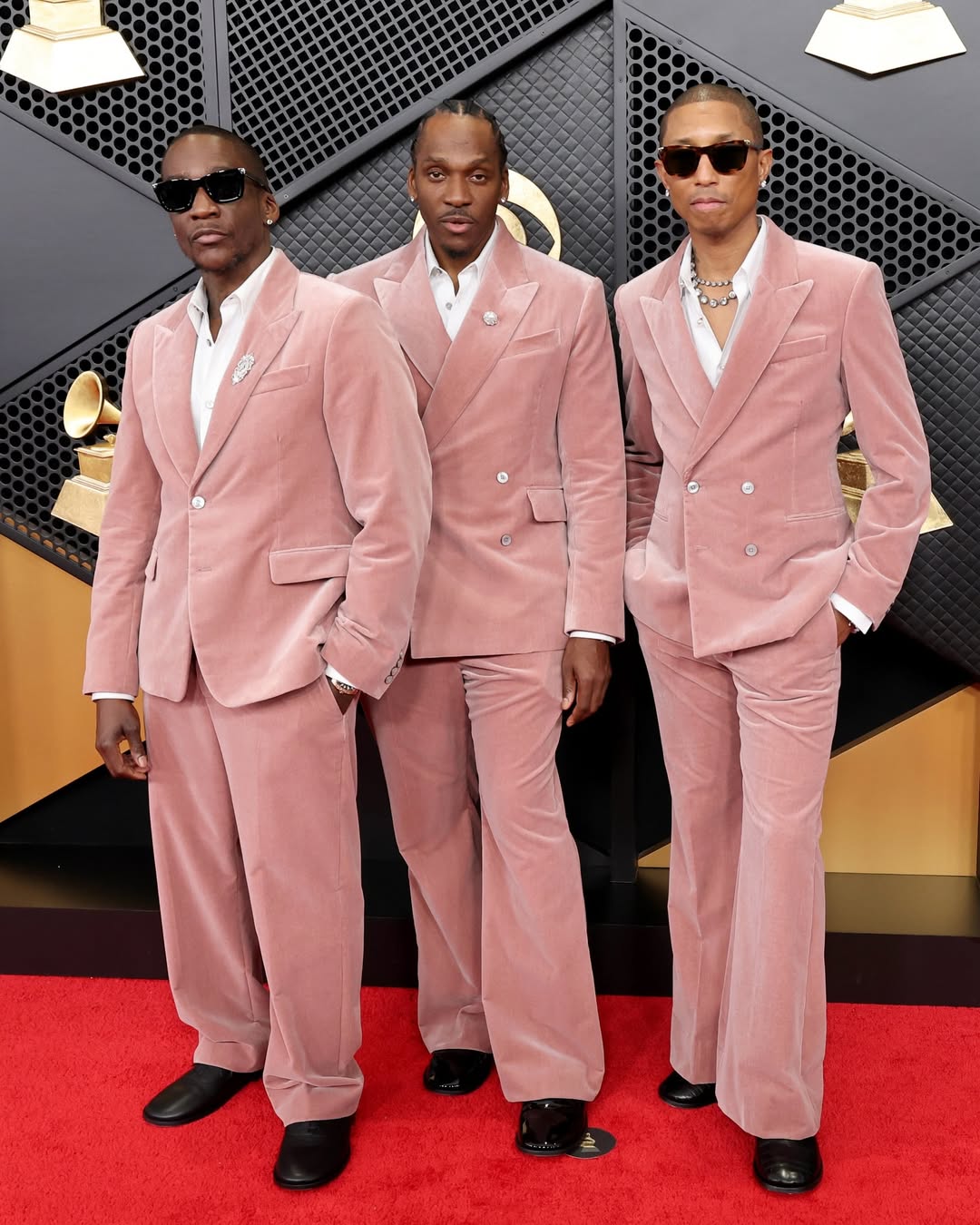 Clipse and Pharrell wore matching outfits to The Grammy red carpet.