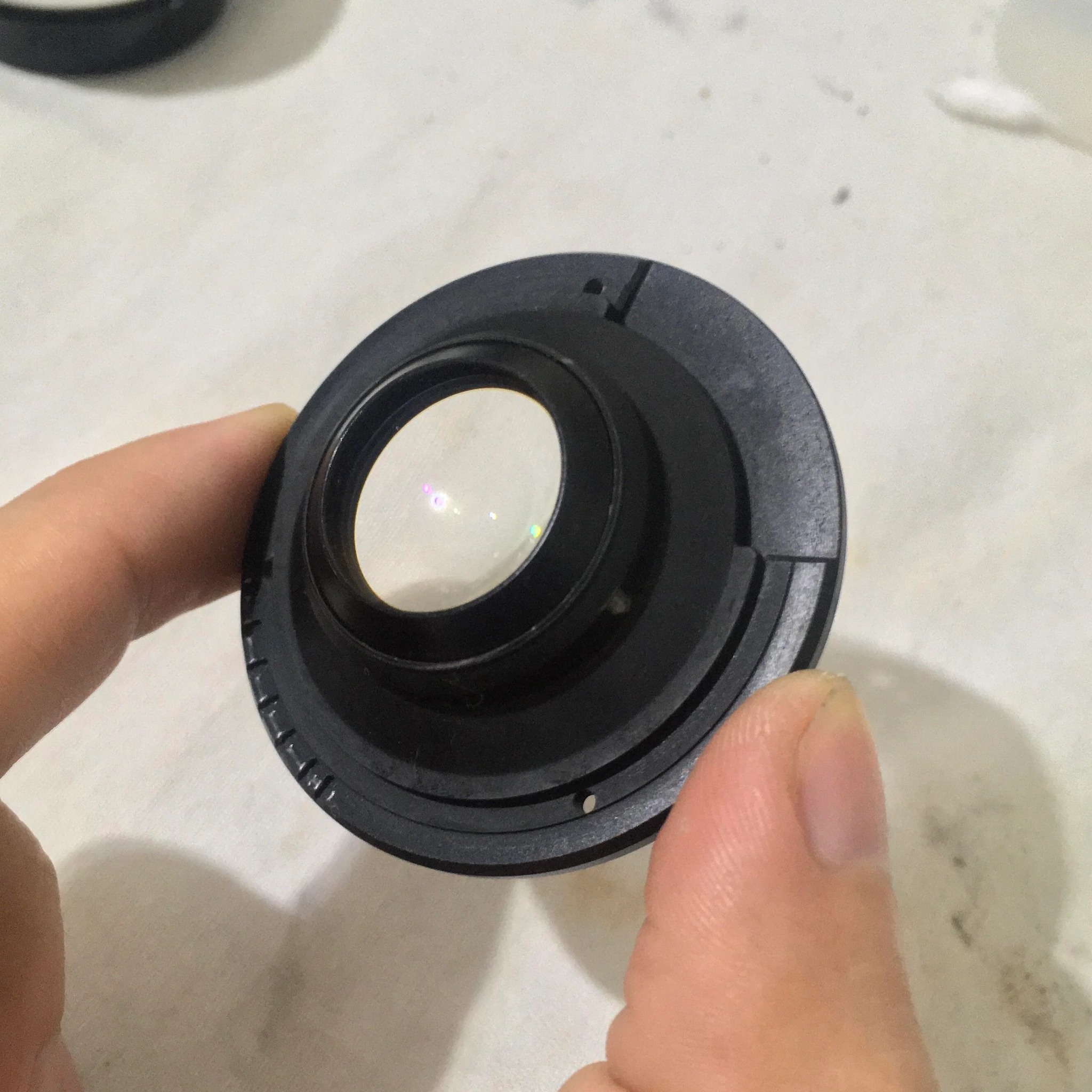 How to disassemble Olympus OM-System 50mm lens to clean fungus?