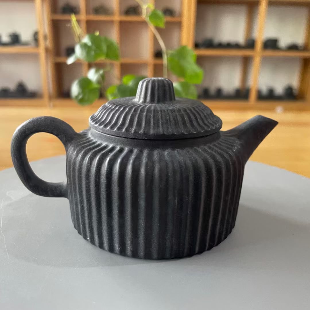 冰碛岩石茶壶优点：纯天然、纯手工、无添加。 特性：天然原石独一无二