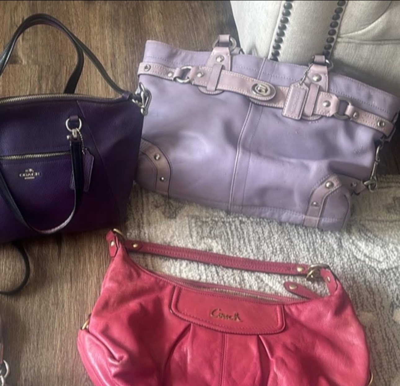 What is the name of the purple Coach bag with white and silver 