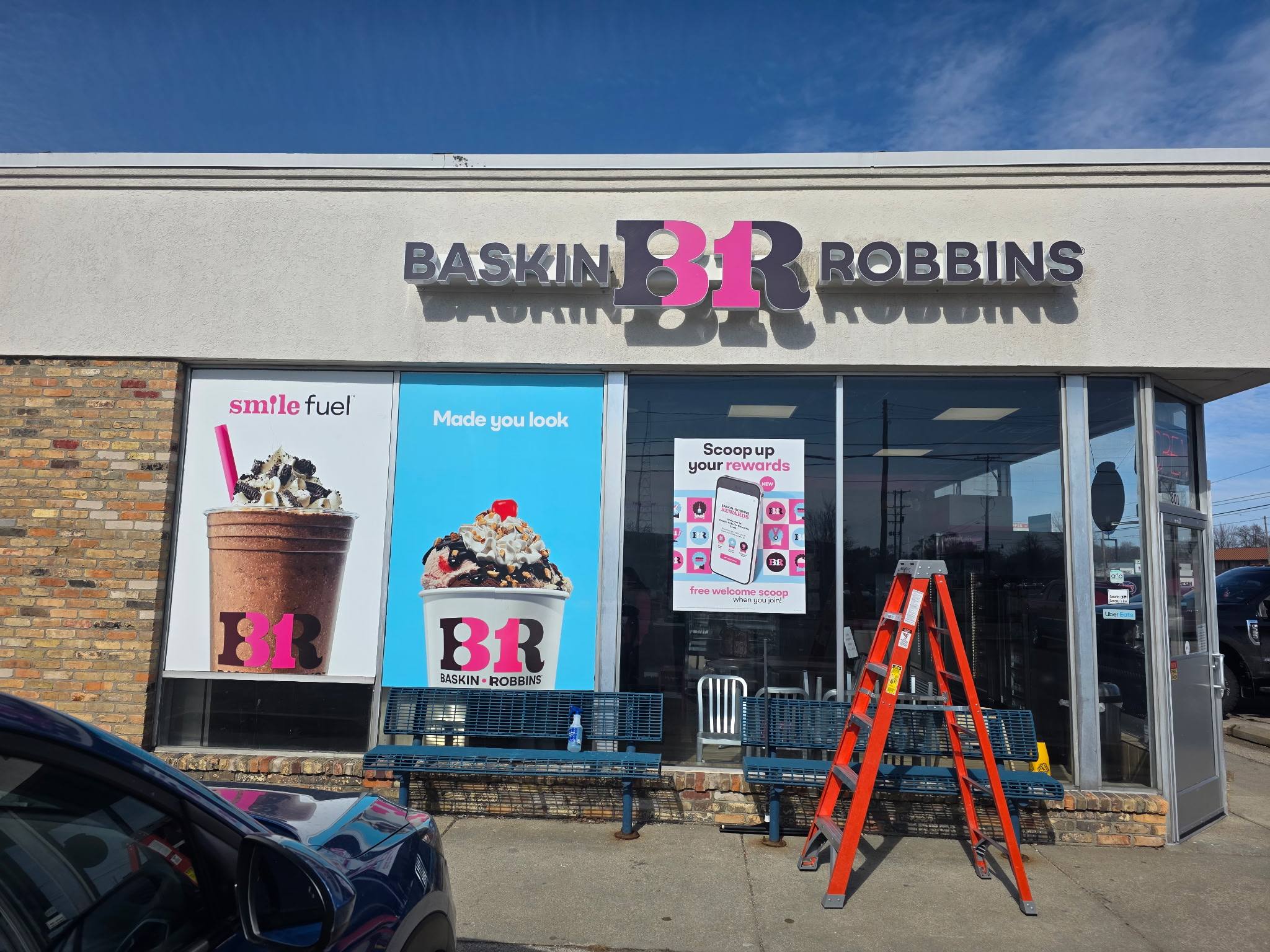 New outside signs are finally up. Plus new window signs to keep