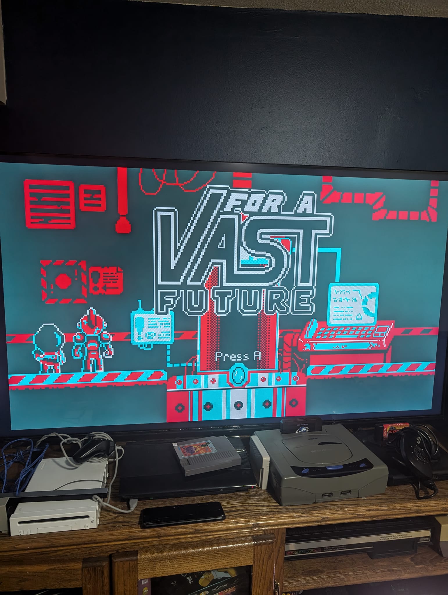 Retro gaming setup with CRT TVs and classic consoles