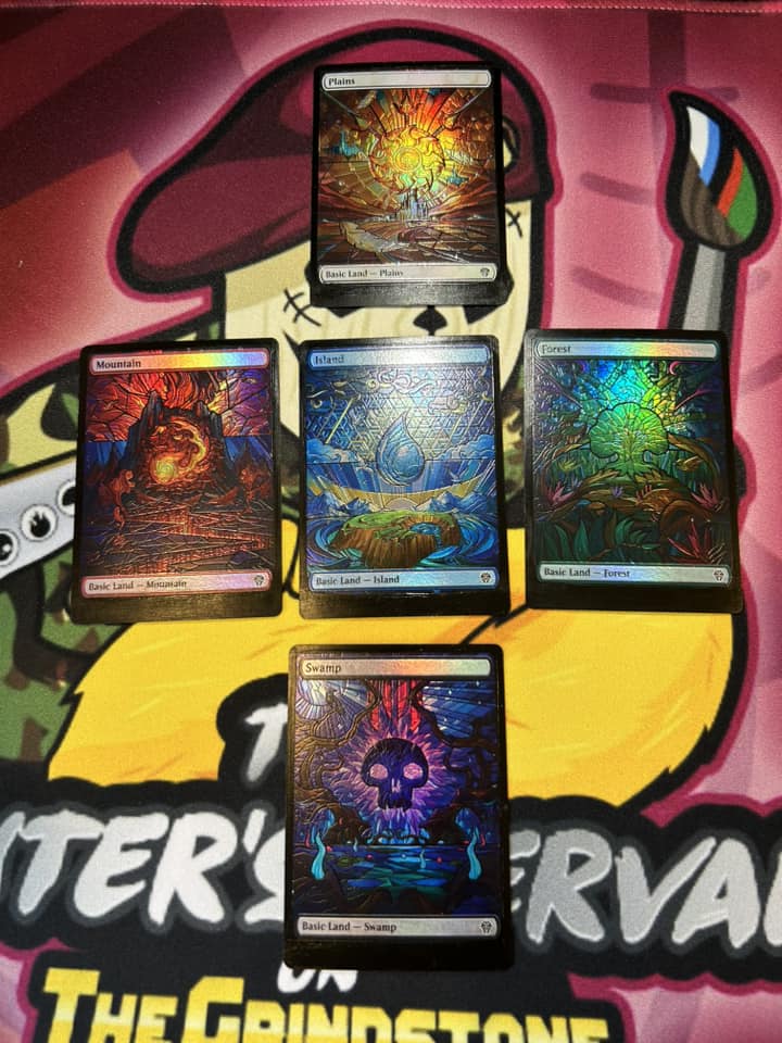 Dominaria United set box pulls with foil stained glass basics