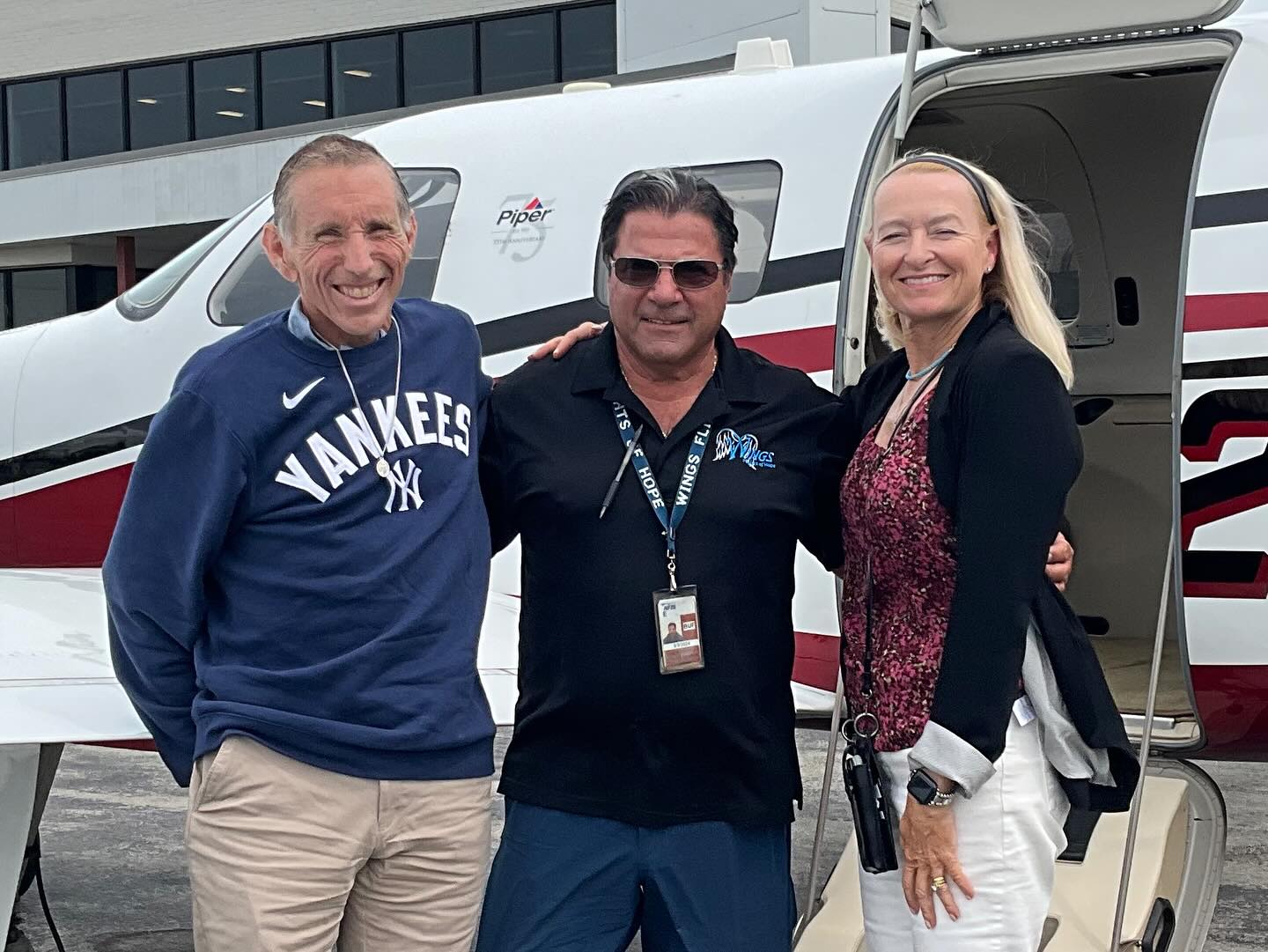 Wings pilot Joe (middle) flies... - Wings Flights of Hope