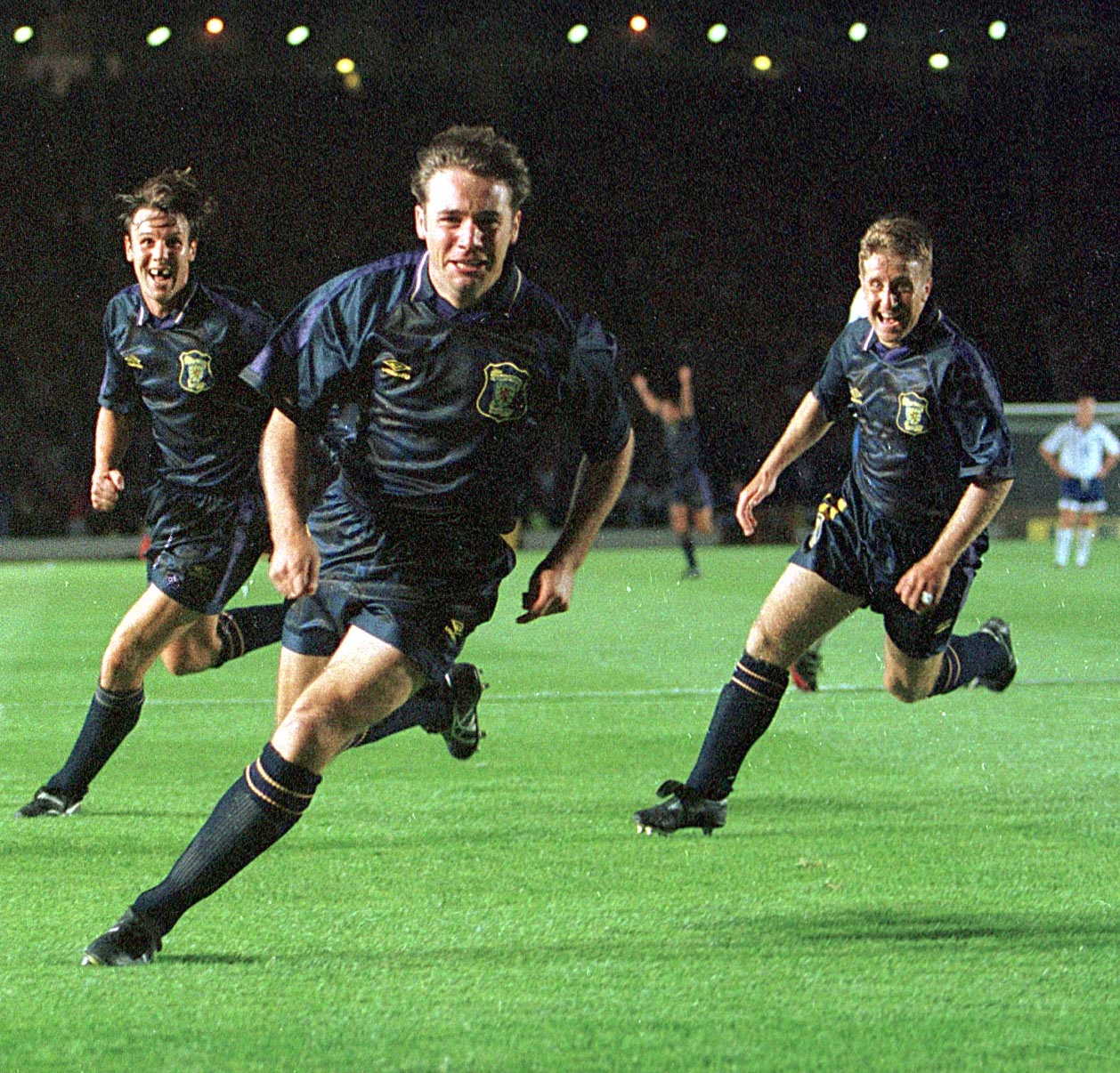 Ally McCoist celebrates his vital winner for Scotland against